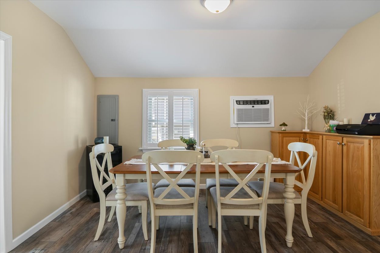 107 Kingston Road Parsippany, NJ 07054 - Photo 9 of 43 a dining room with furniture and window