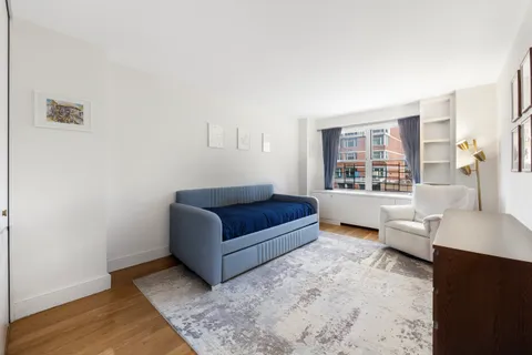 a living room with furniture and windows