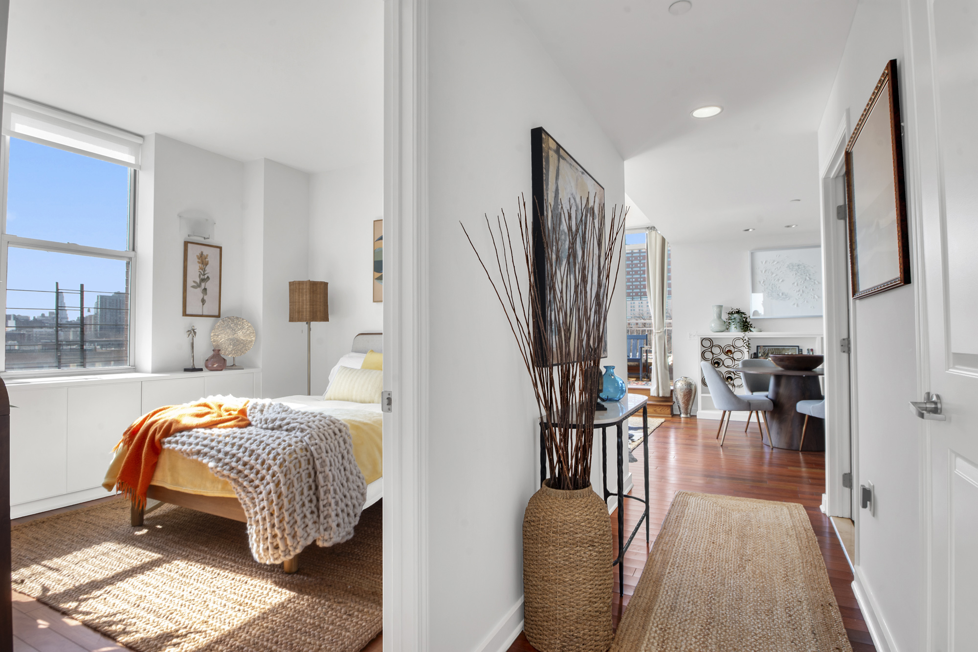 301 West 118th Street, Unit PH1F Manhattan, NY 10026 - Photo 10 of 15 a bedroom with furniture and a wooden floor