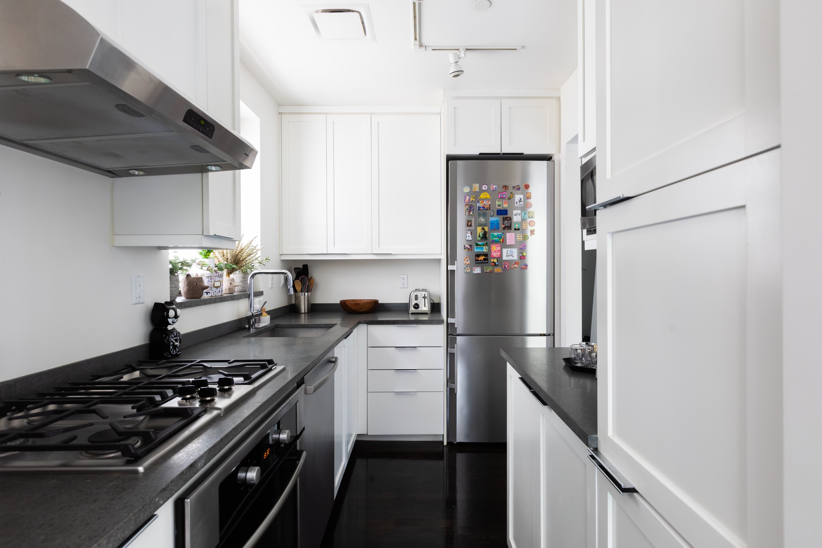 422 West 20th Street, Unit 3G Manhattan, NY 10011 - Photo 6 of 15 a kitchen with a stove and a refrigerator