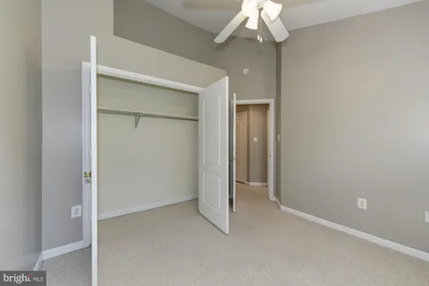 an empty room with a bathroom