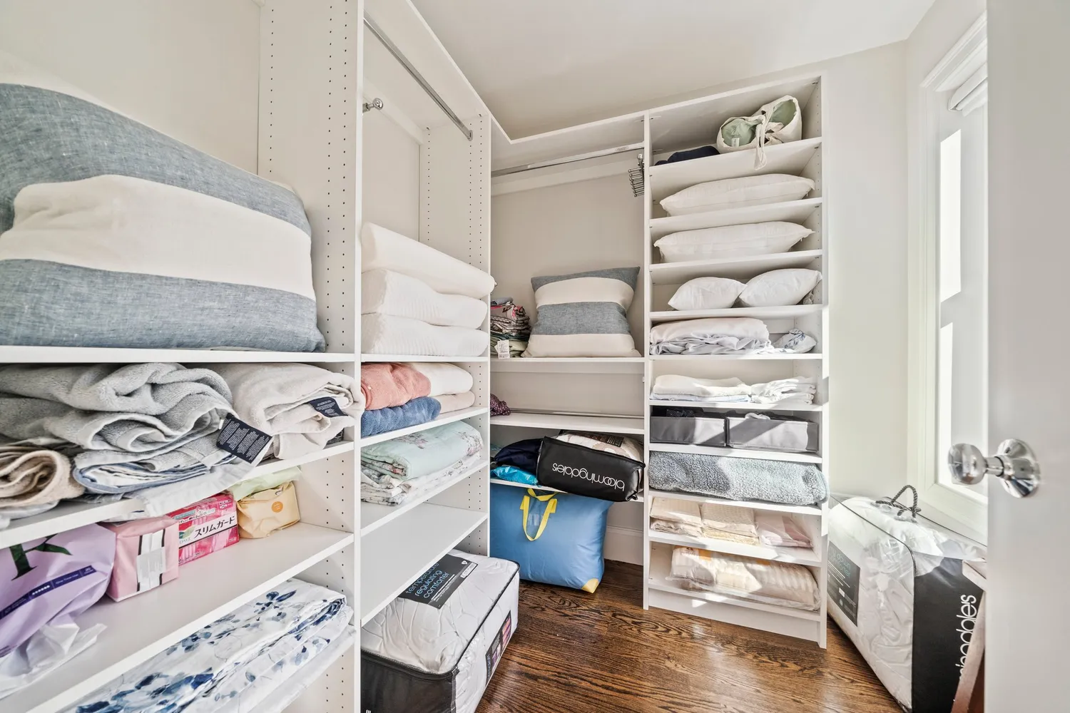 an aerial view of a residential houses with yard