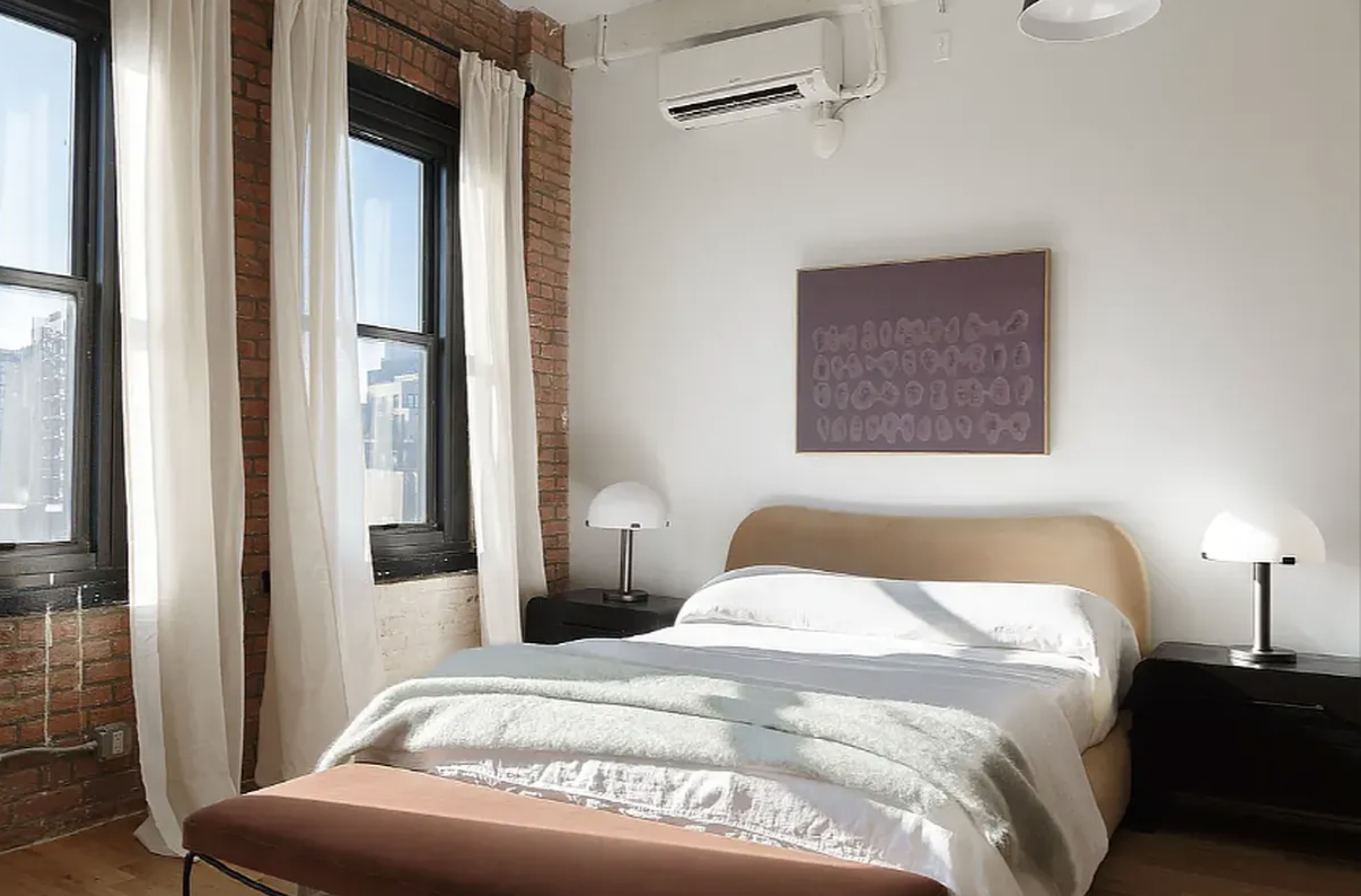 239 Banker Street Brooklyn, NY 11222 - Photo 3 of 11 a bedroom with a bed and a night stand