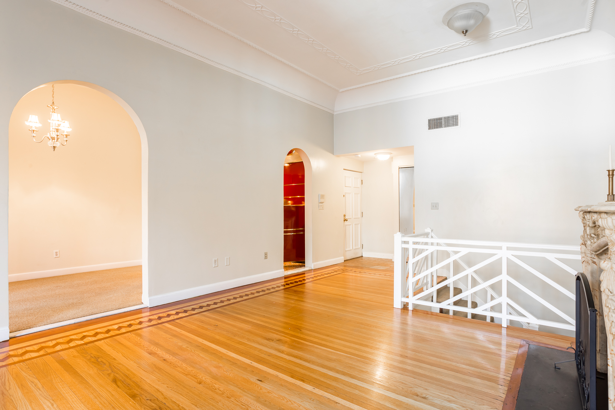 327 Commonwealth Avenue Boston, MA 02115 - Photo 10 of 26 a view of an empty room with wooden floor