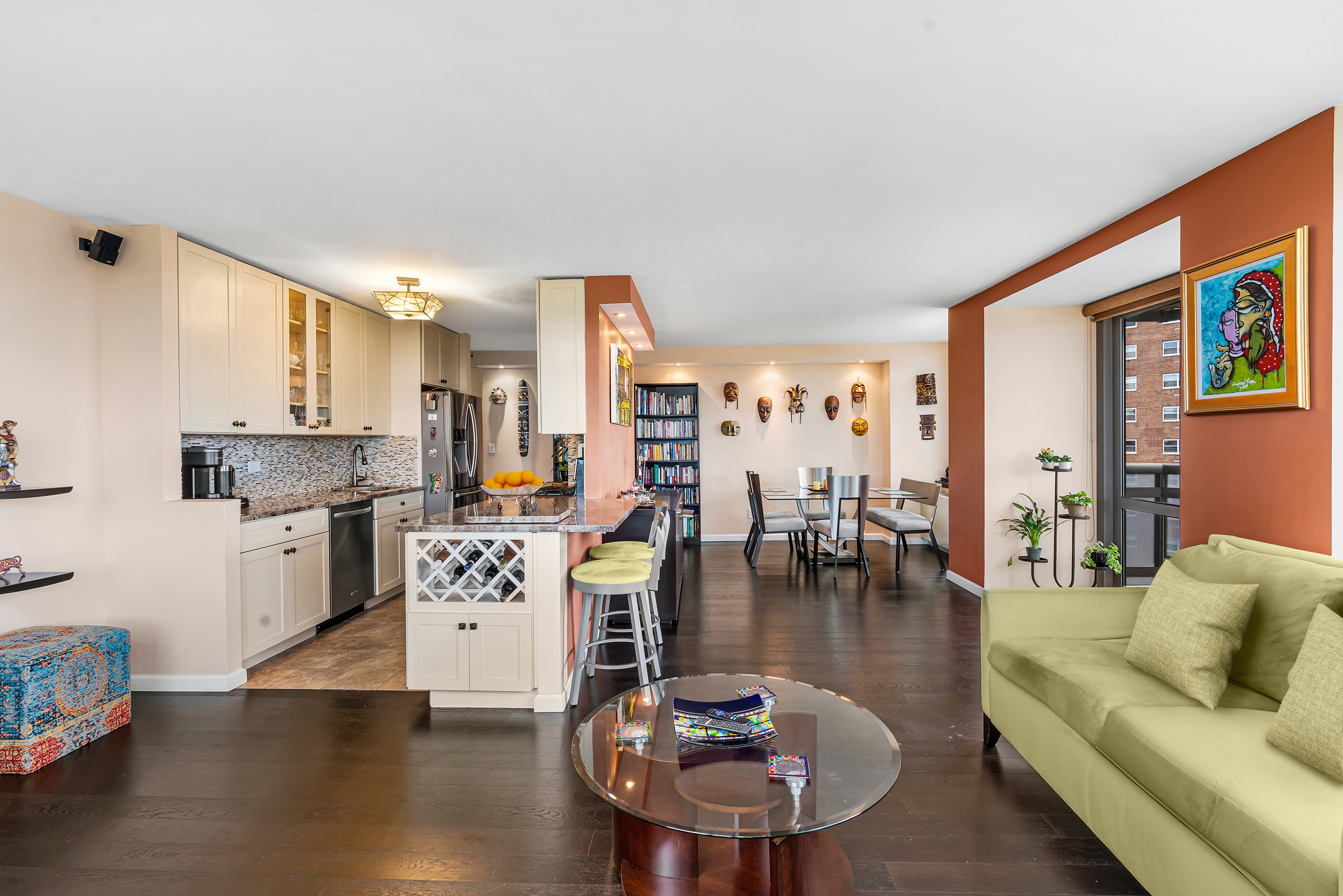 112-01 Queens Boulevard, Unit 6J Queens, NY 11375 - Photo 3 of 29 a living room with fireplace furniture and a dining table with wooden floor