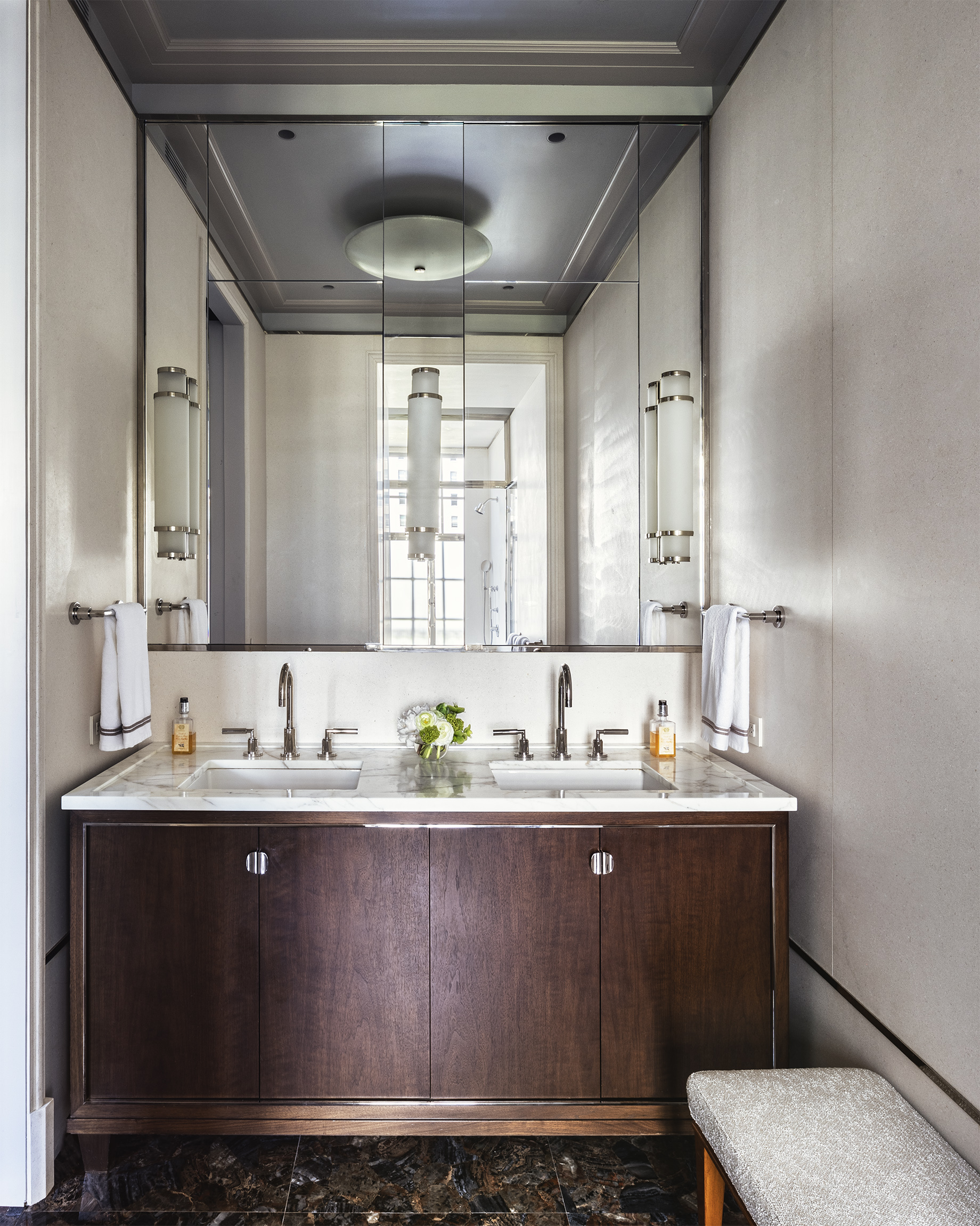 2 East 70th Street, Unit 4A Manhattan, NY 10021 - Photo 7 of 17 a bathroom with a granite countertop sink a toilet and a mirror