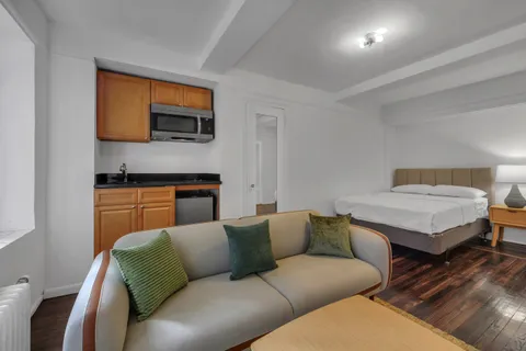 a living room with a couch and a flat screen tv