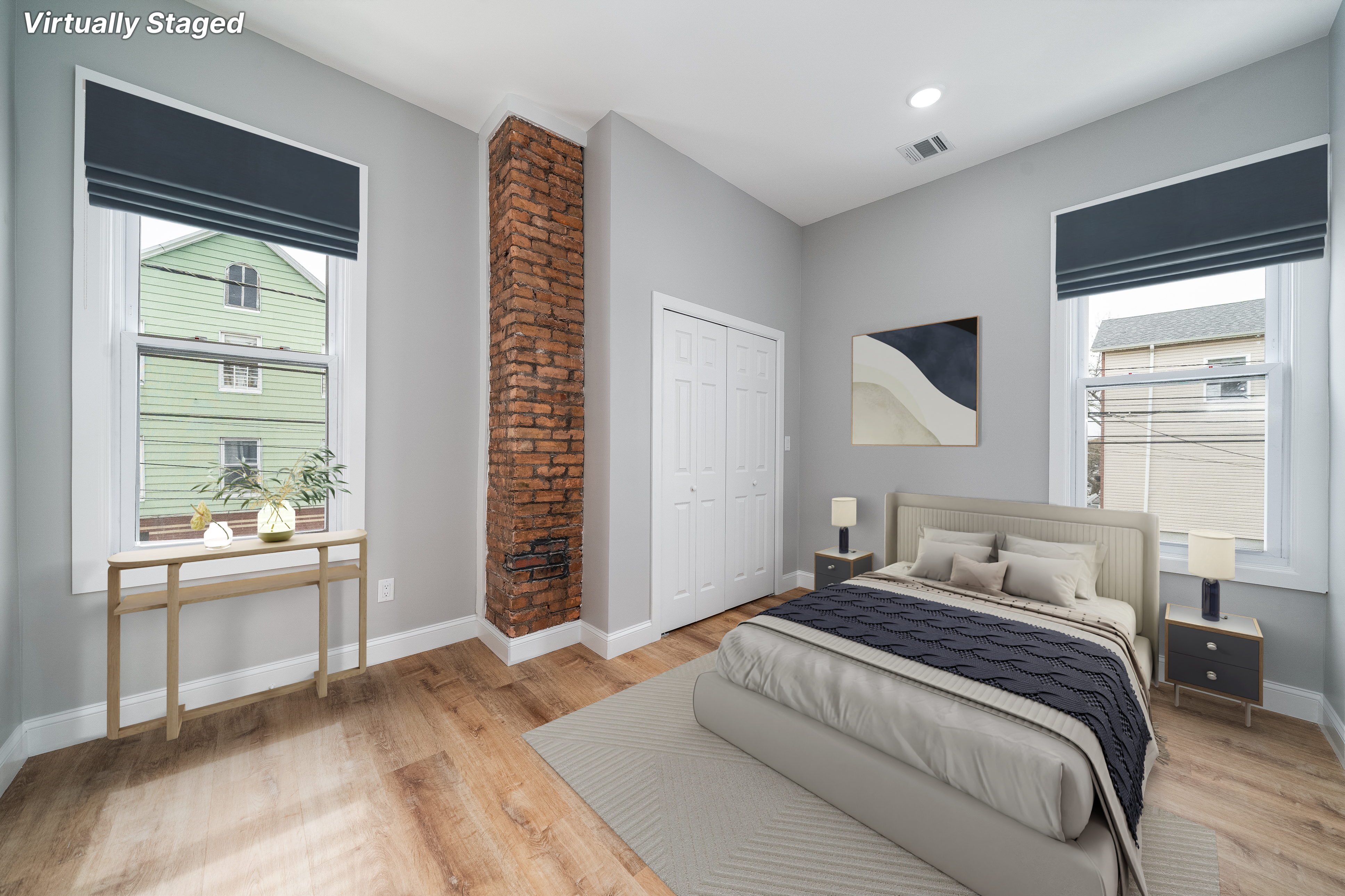 1076 Summit Avenue Jersey City, NJ 07307 - Photo 5 of 8 a bedroom with a large bed and a window