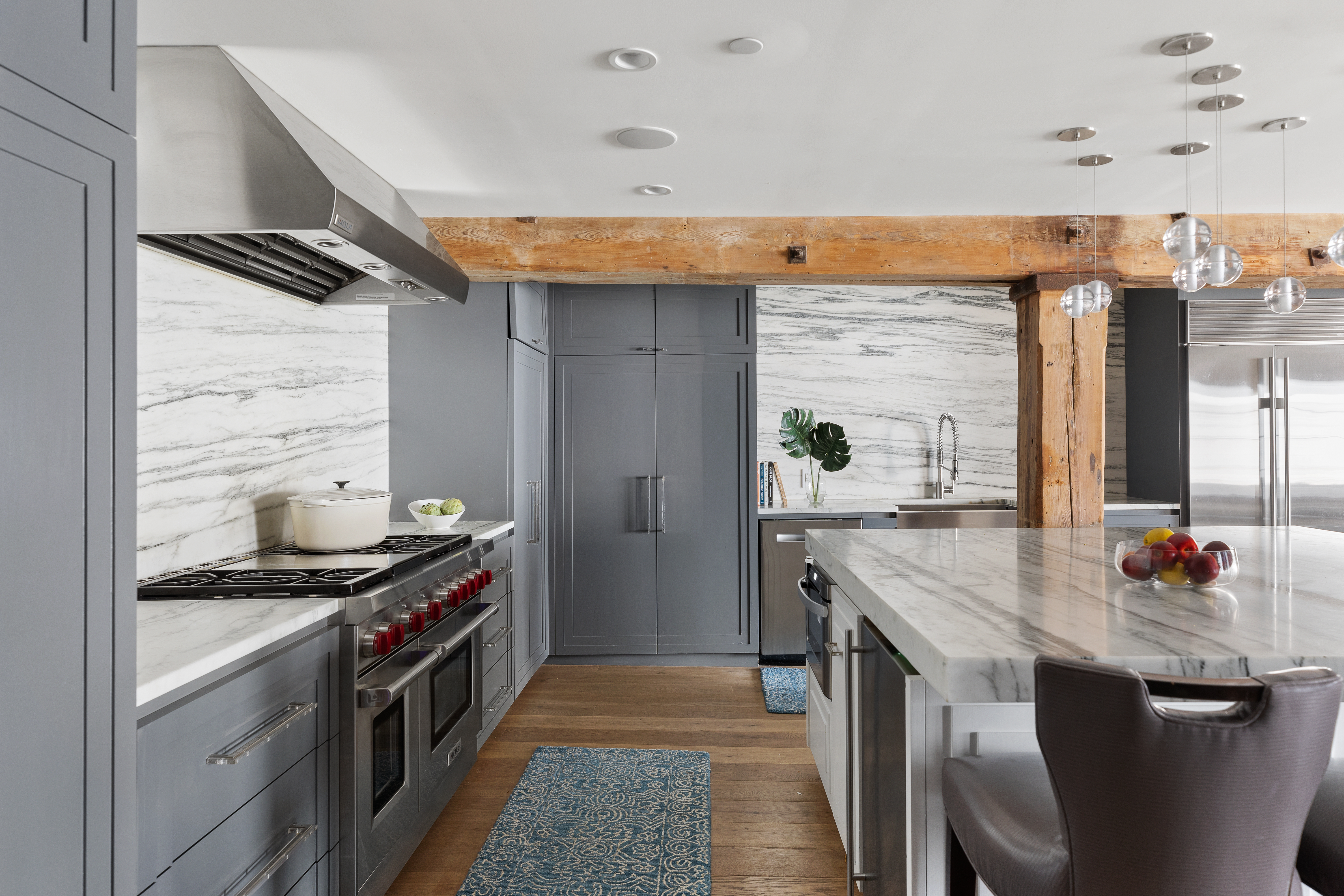 466 Washington Street, Unit 3W Manhattan, NY 10013 - Photo 3 of 14 a kitchen with stainless steel appliances granite countertop a stove and a sink