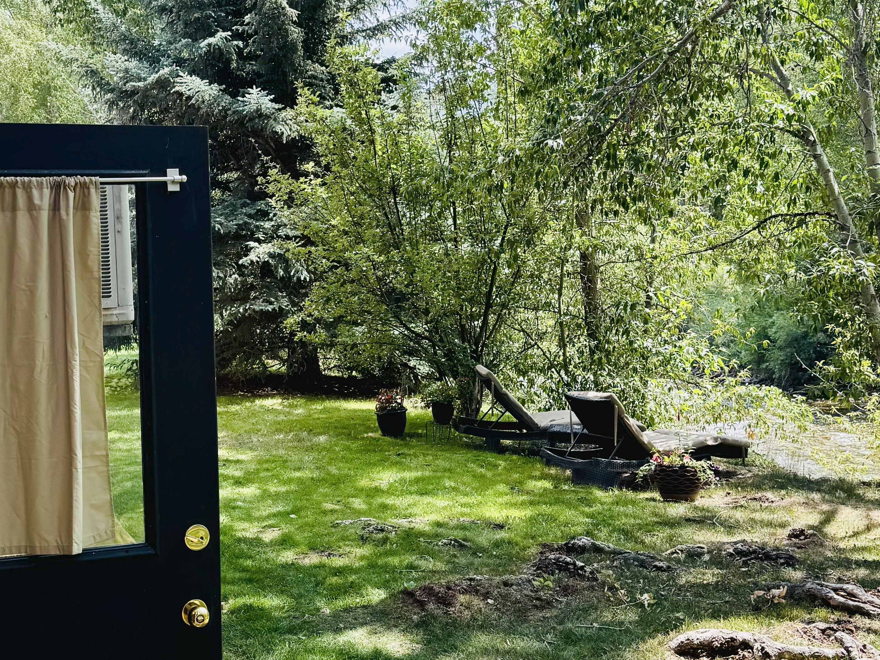 23286 Two Rivers Road, Unit 23 Basalt, CO 81621 - Photo 4 of 14 a view of an outdoor space with a lake view