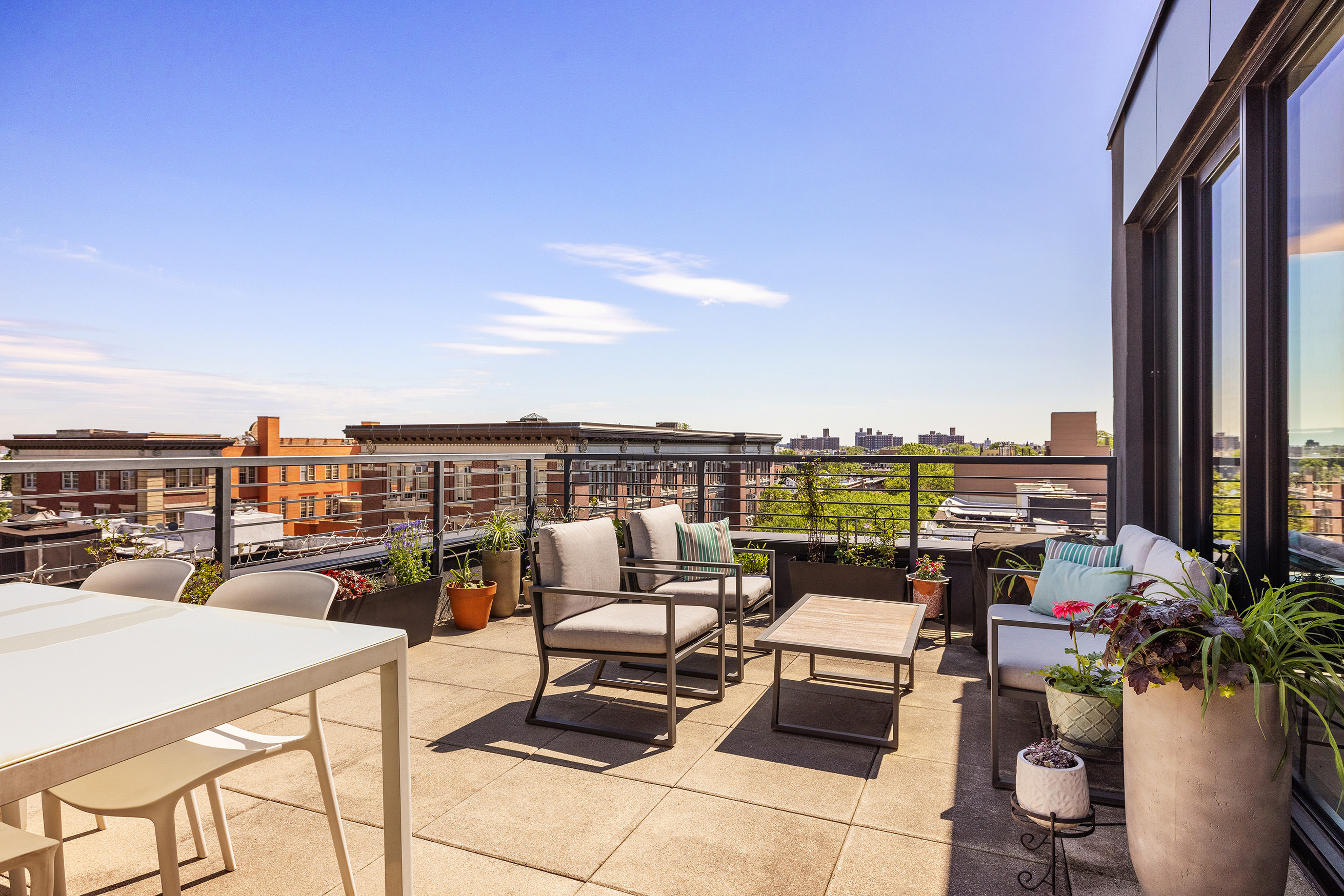 762 Park Place, Unit PH1 Brooklyn, NY 11216 - Photo 13 of 15 a terrace view with sitting space