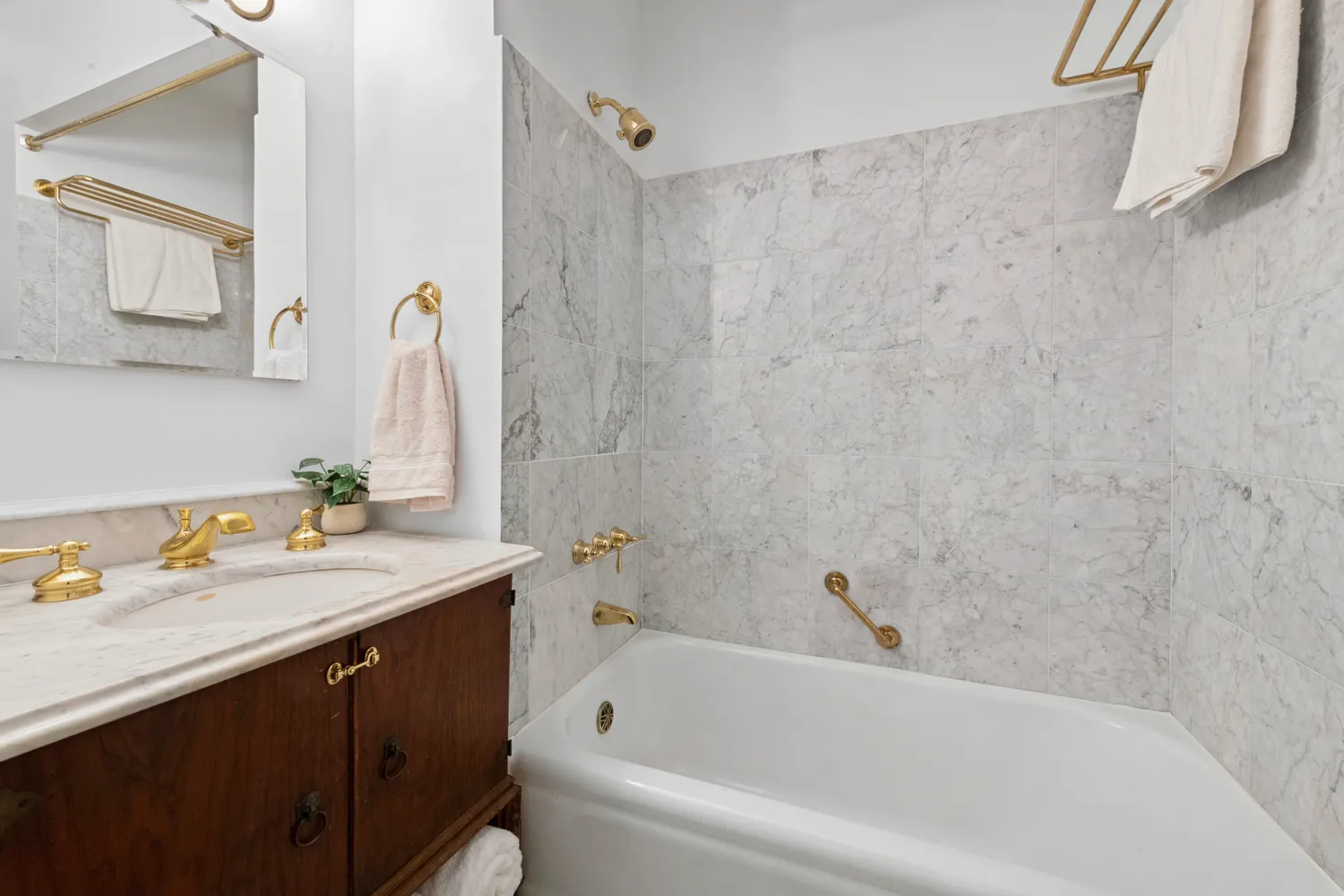 a bathroom with a sink and a bathtub