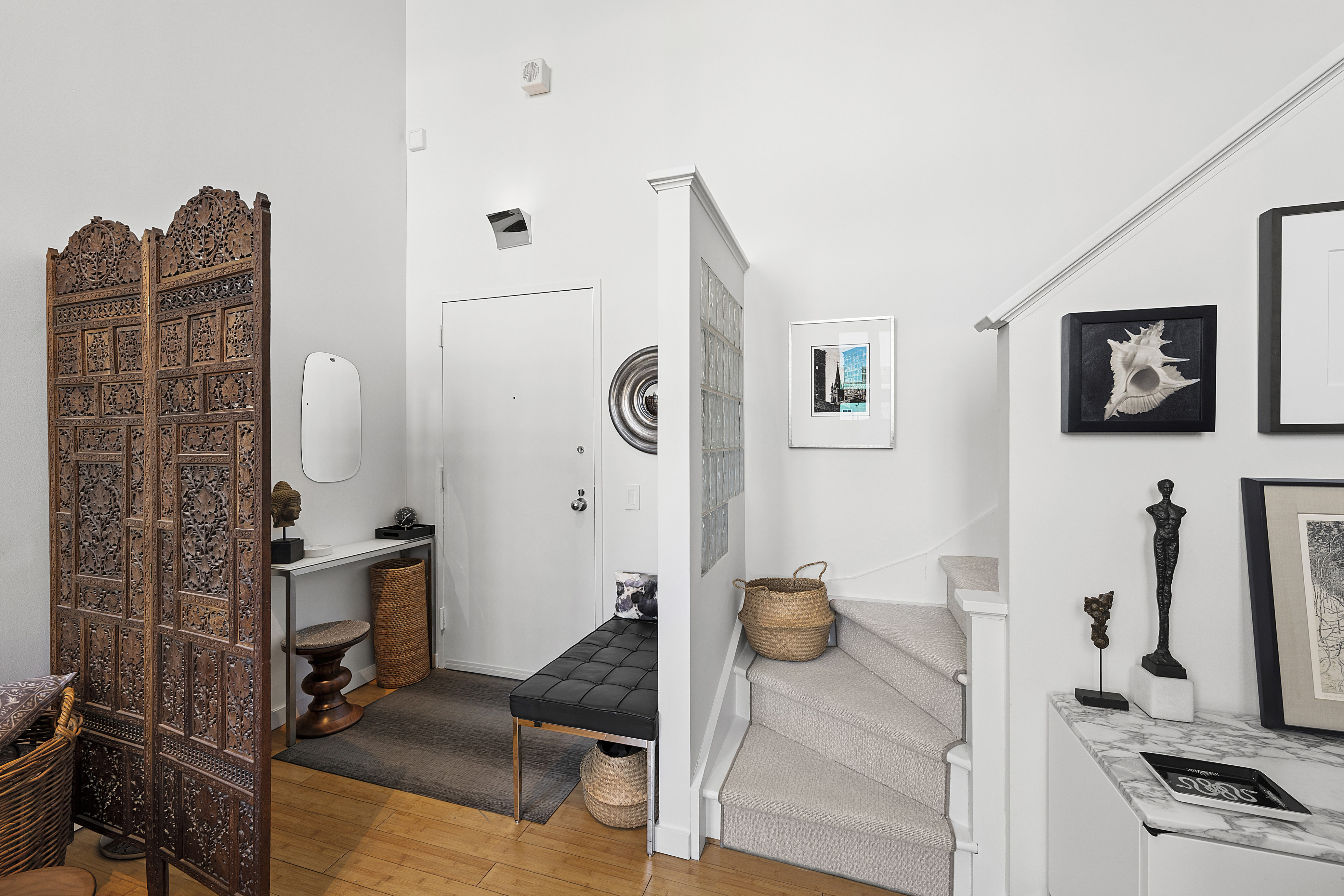 135 West 70th Street, Unit 8A Manhattan, NY 10023 - Photo 10 of 14 a living room with furniture and a flat screen tv
