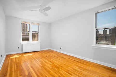 a view of empty room with windows