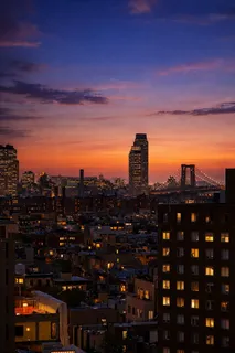 a view of a city with tall buildings