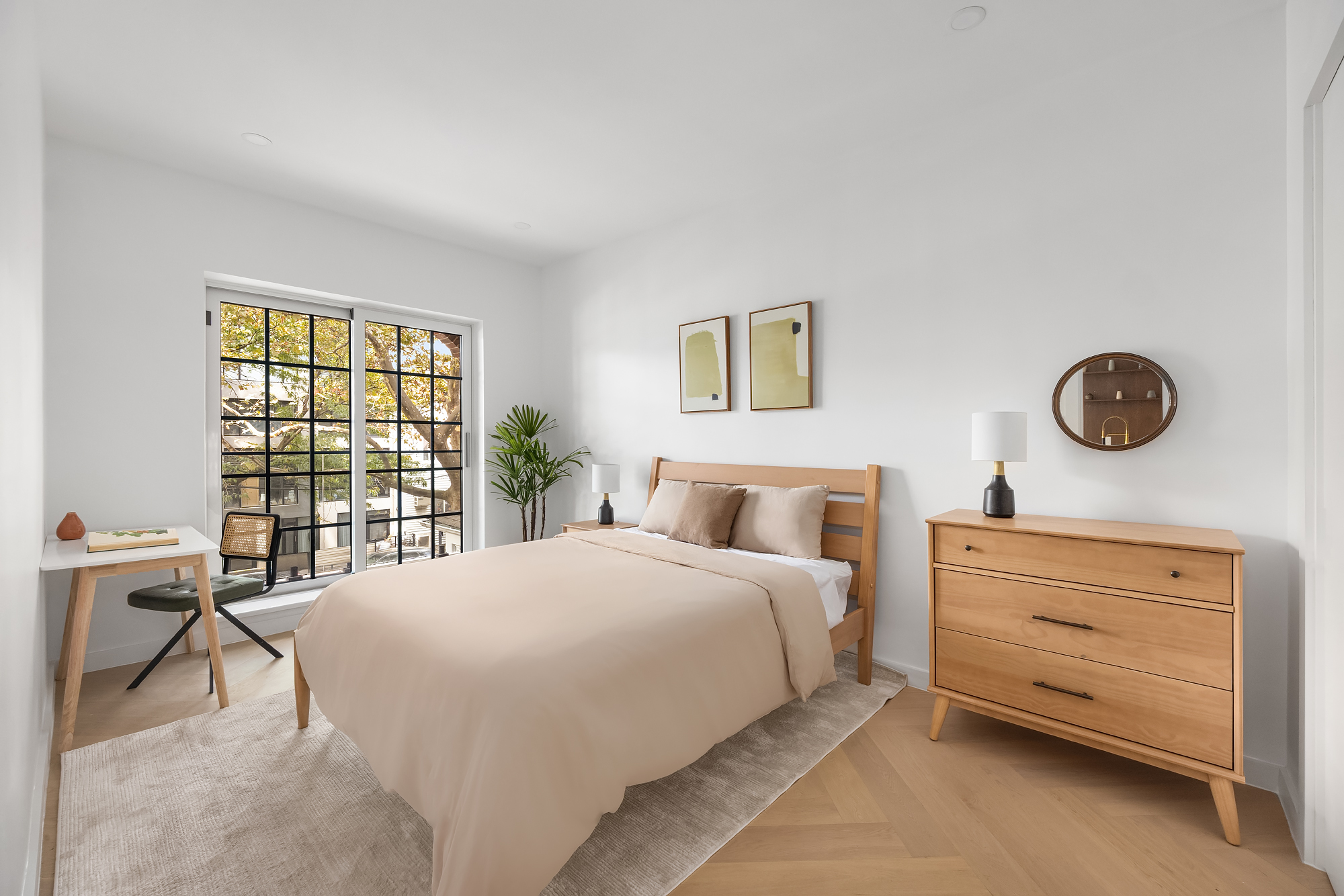 90 Herbert Street, Unit 2A Brooklyn, NY 11222 - Photo 7 of 10 a bedroom with a bed and a window