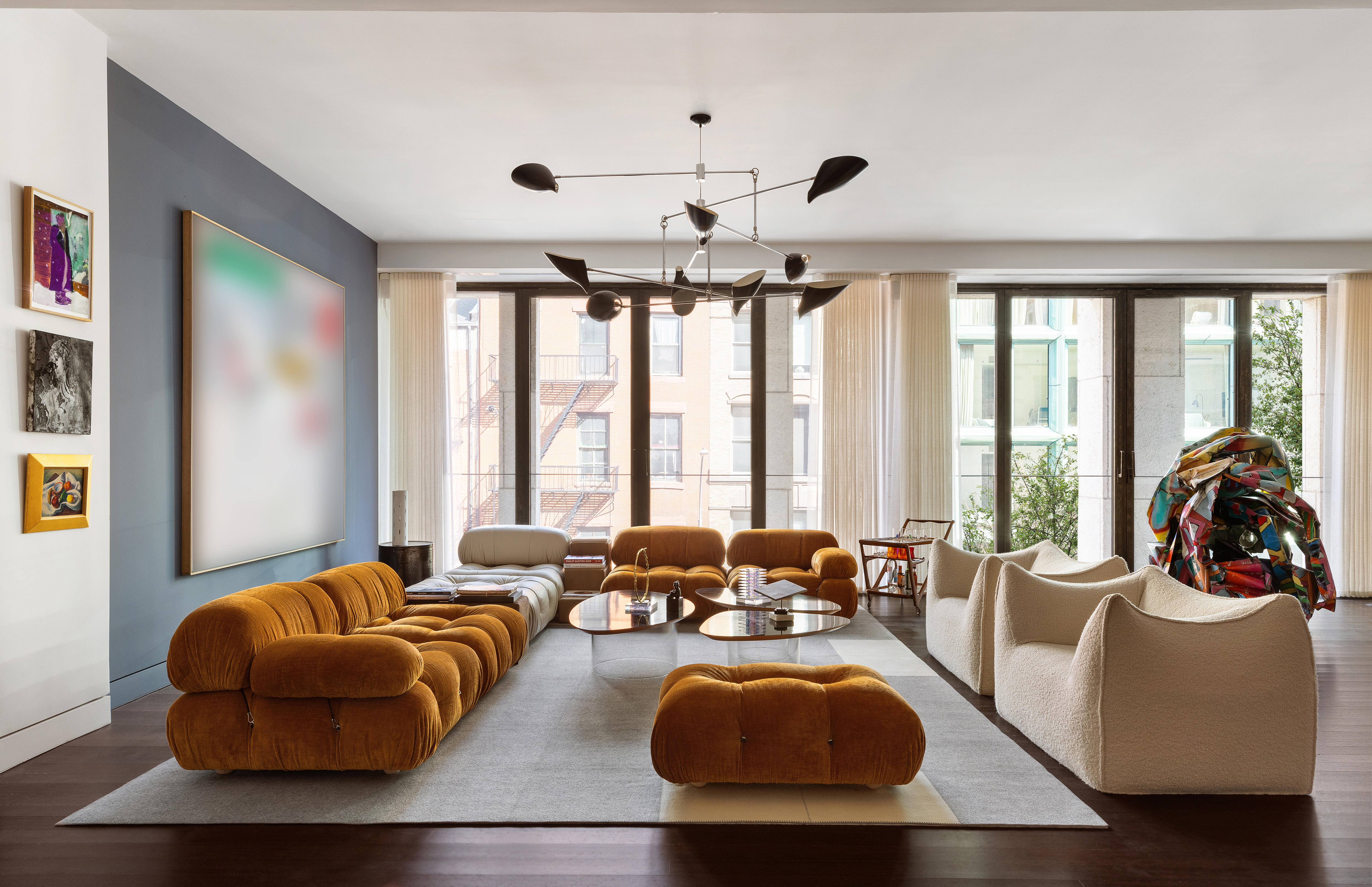 25 Bond Street, Unit 3E Manhattan, NY 10012 - Photo 2 of 23 a living room with furniture and large windows