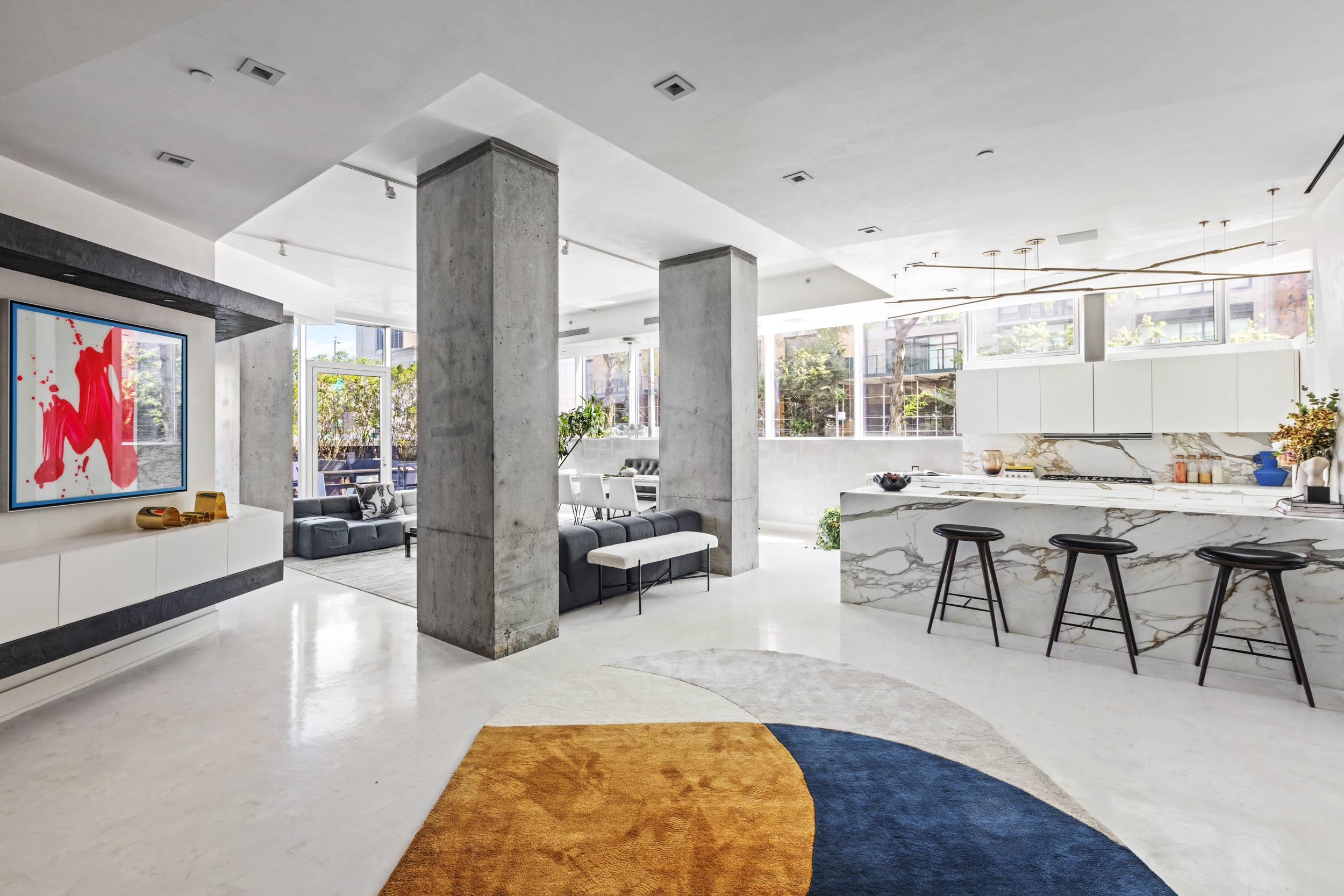 471 Washington Street, Unit 1B Manhattan, NY 10013 - Photo 5 of 17 a living room with furniture and a large window