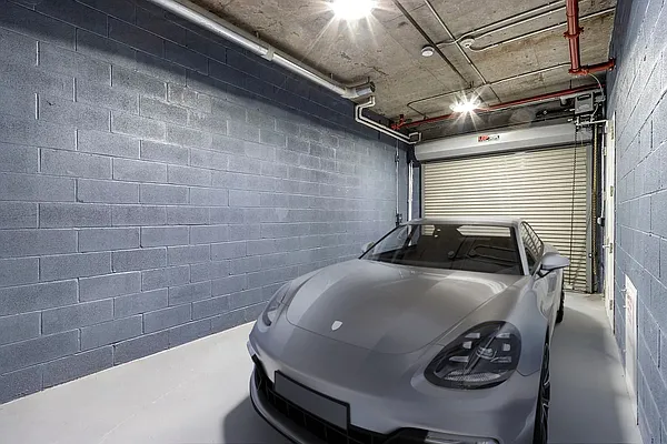 215 Sullivan Street, Unit THC Manhattan, NY 10012 - Photo 2 of 16 a car parked in a parking