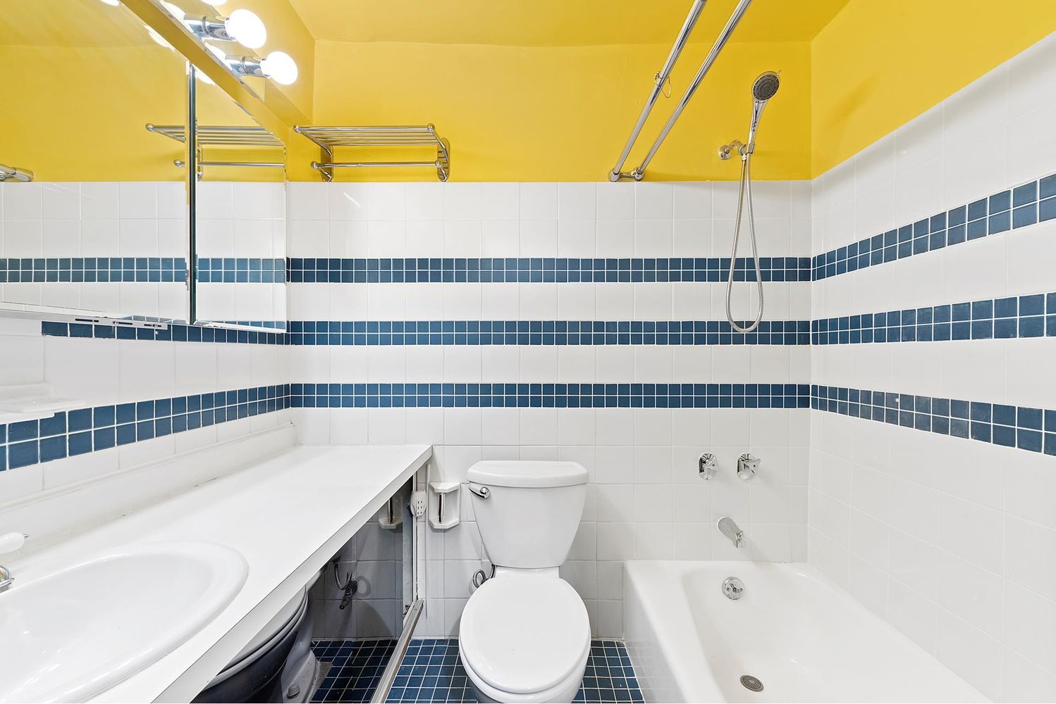 40 Sutton Place, Unit 8D Manhattan, NY 10022 - Photo 7 of 12 a bathroom with a sink and a toilet