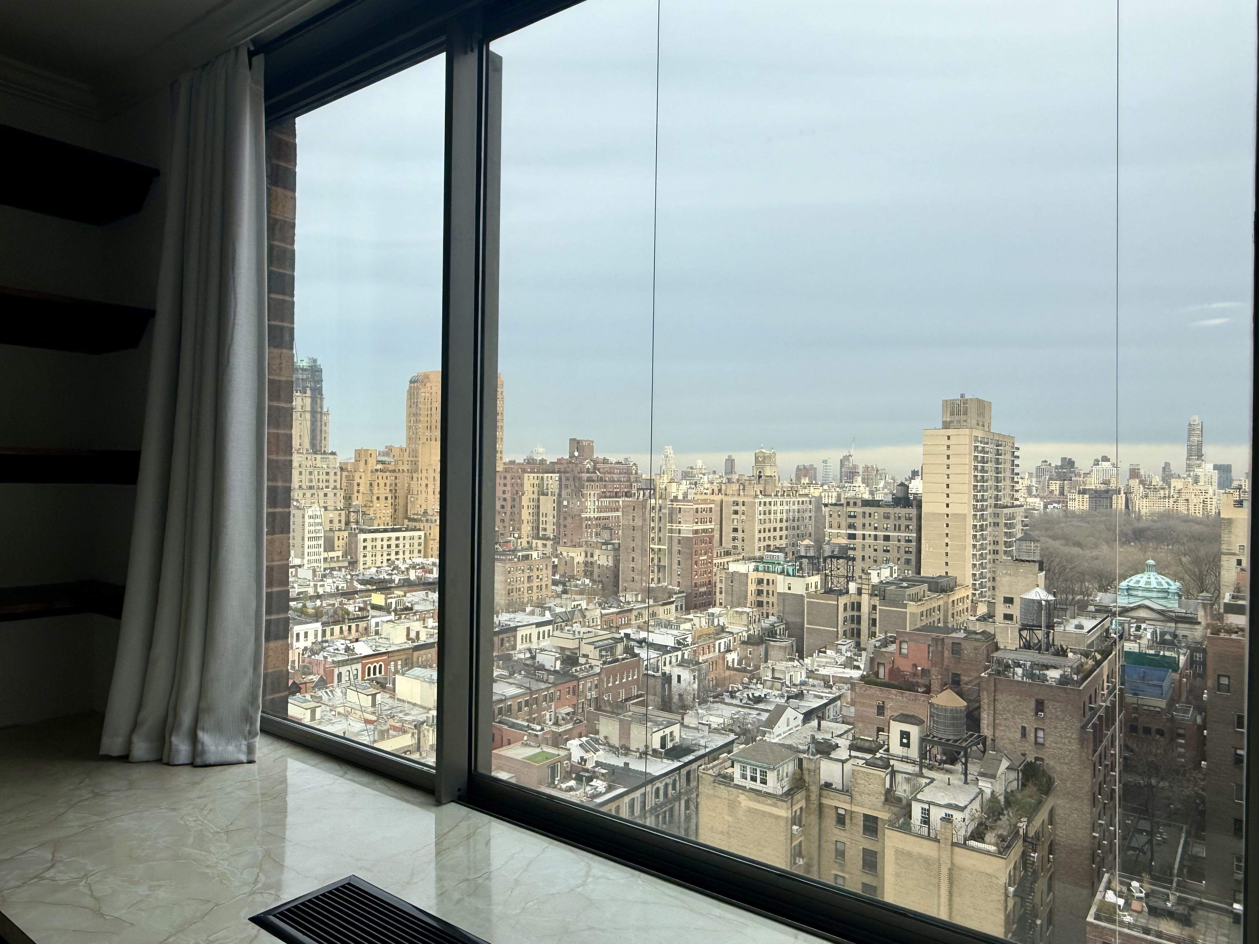 111 West 67th Street, Unit 22K Manhattan, NY 10023 - Photo 8 of 14 a view of a city from a window