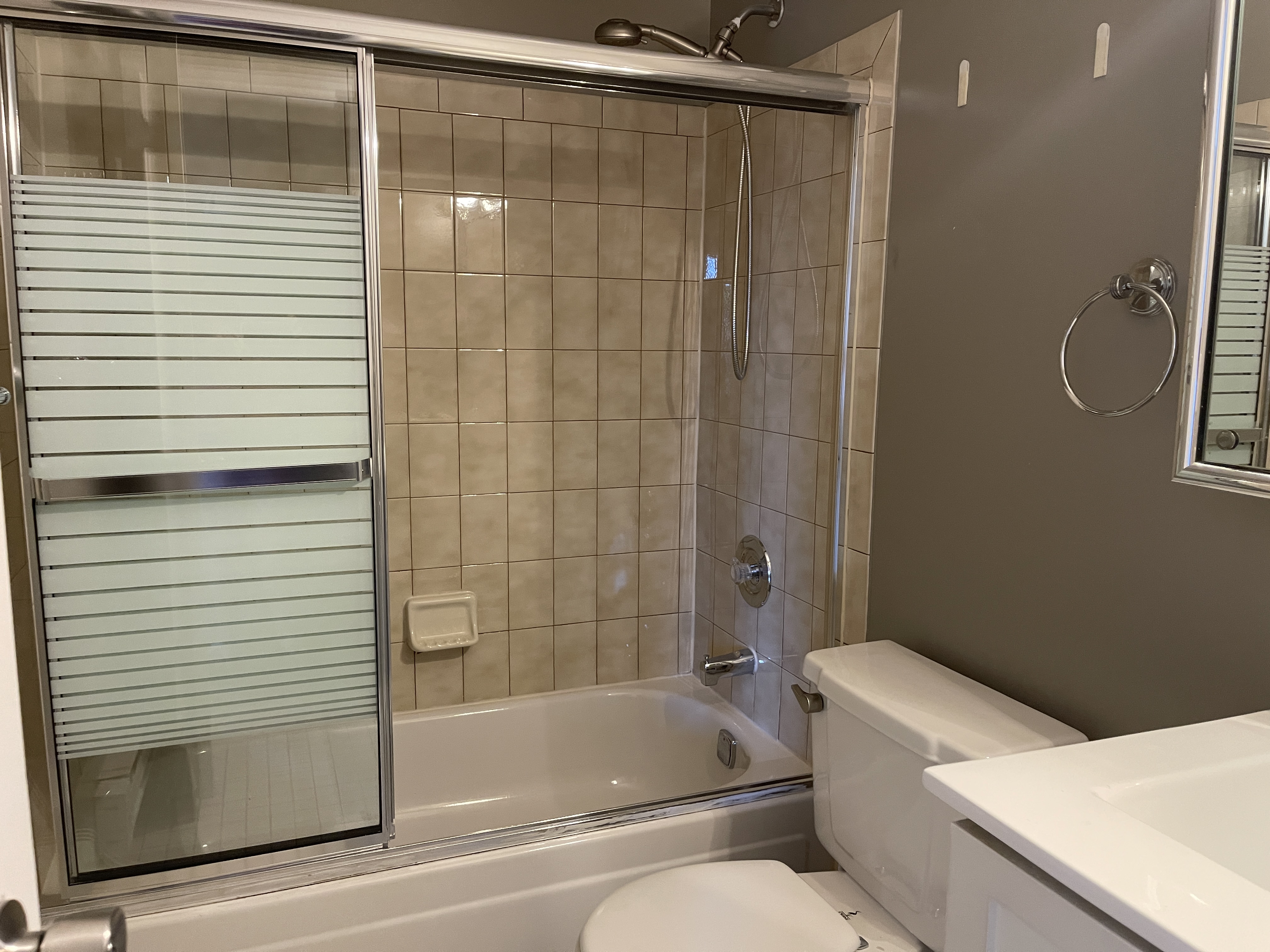 25-40 Shore Boulevard, Unit 6F Queens, NY 11102 - Photo 7 of 17 a bathroom with a toilet and a shower