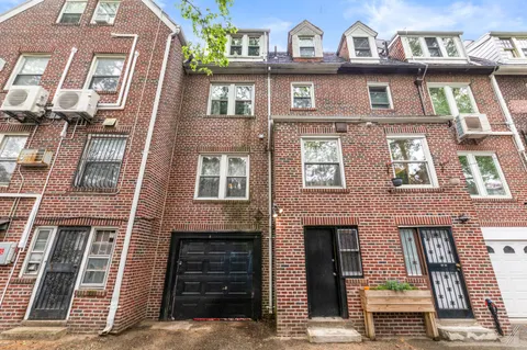 a front view of a multi story residential apartment building