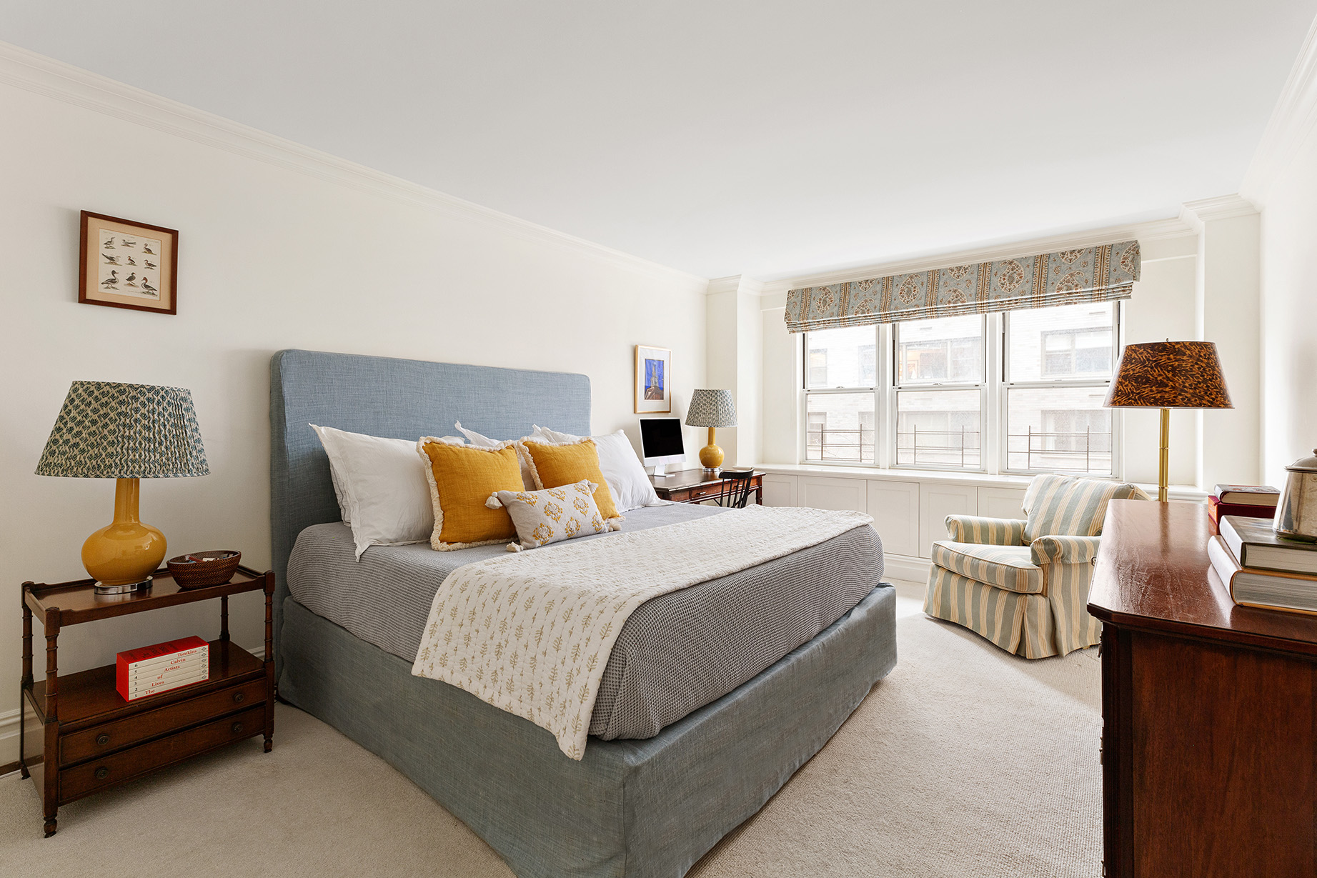 174 East 74th Street, Unit 3A Manhattan, NY 10021 - Photo 5 of 11 a bedroom with a bed and a window