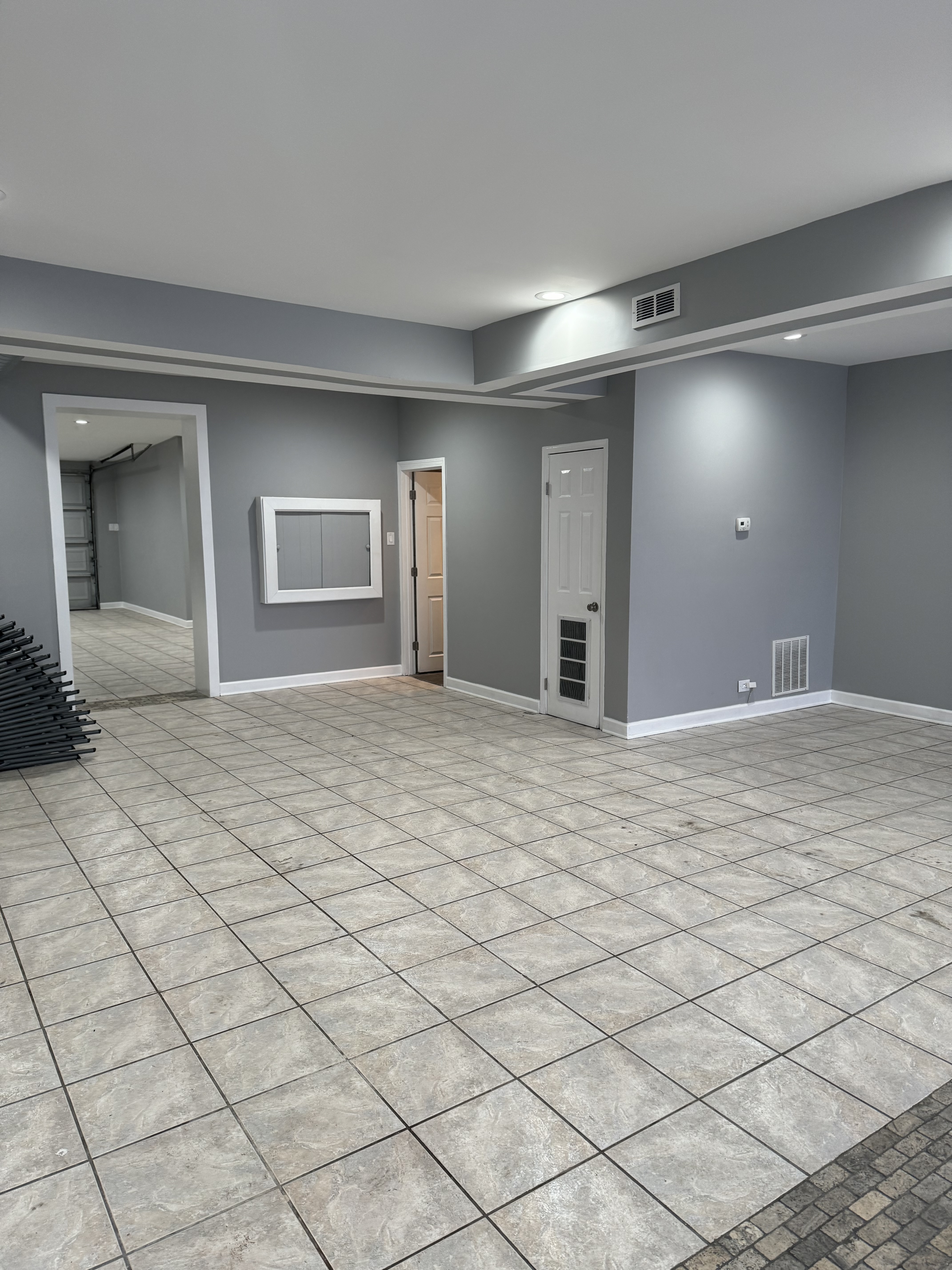 2541 West 79th Street Chicago, IL 60652 - Photo 3 of 5 a view of a livingroom with a chandelier