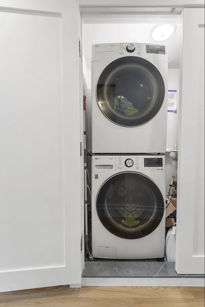 169 Putnam Avenue, Unit 2 Brooklyn, NY 11216 - Photo 8 of 10 a utility room with dryer and washer