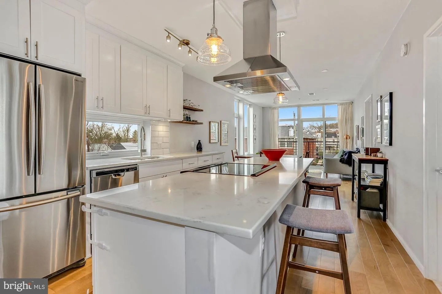a kitchen with a table and chairs in it