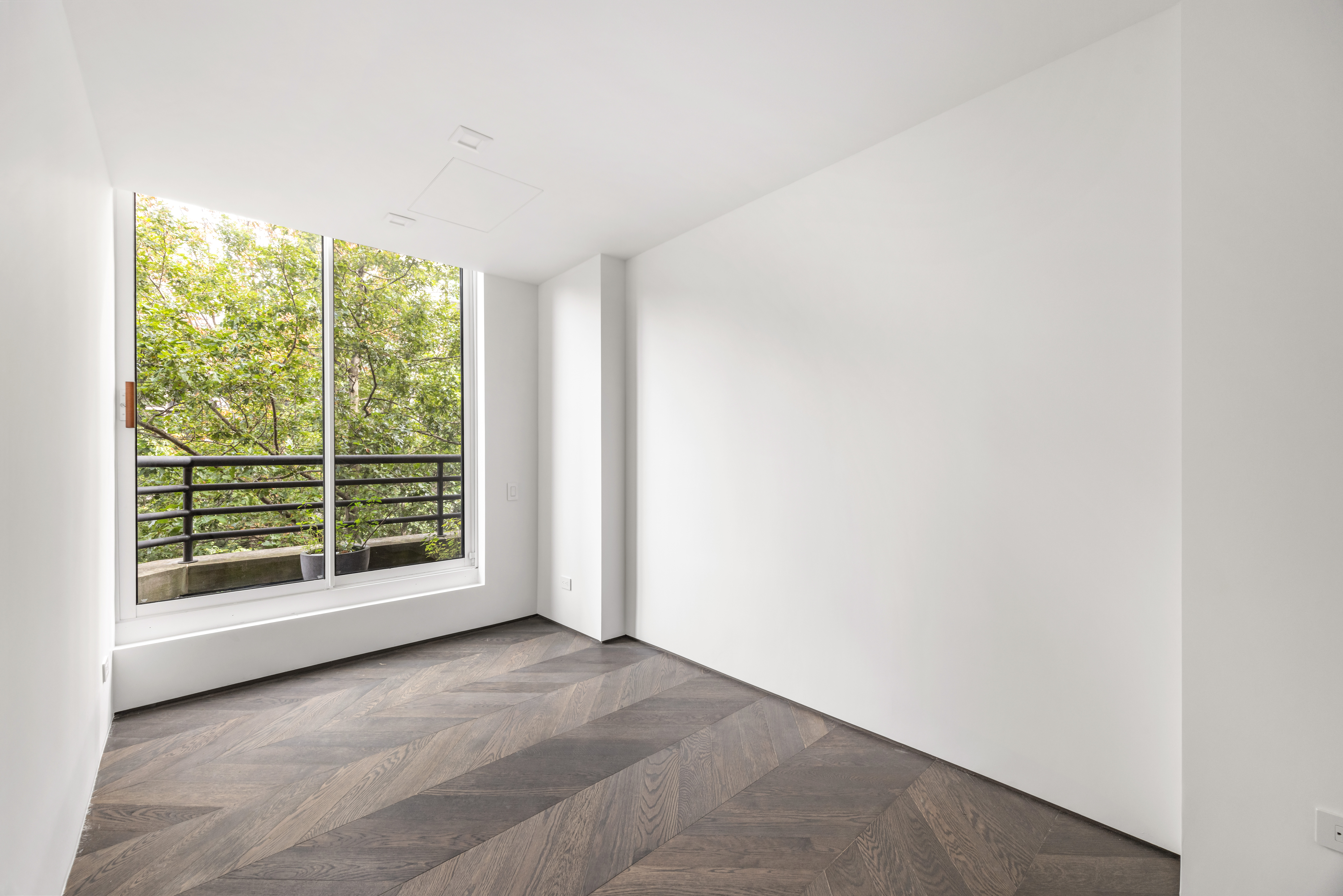 340 Albany Street Manhattan, NY 10280 - Photo 19 of 24 a view of empty room with floor to ceiling window