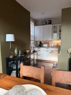 a bedroom with a bed and lamp