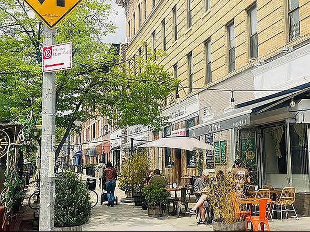 a front view of a building with street view