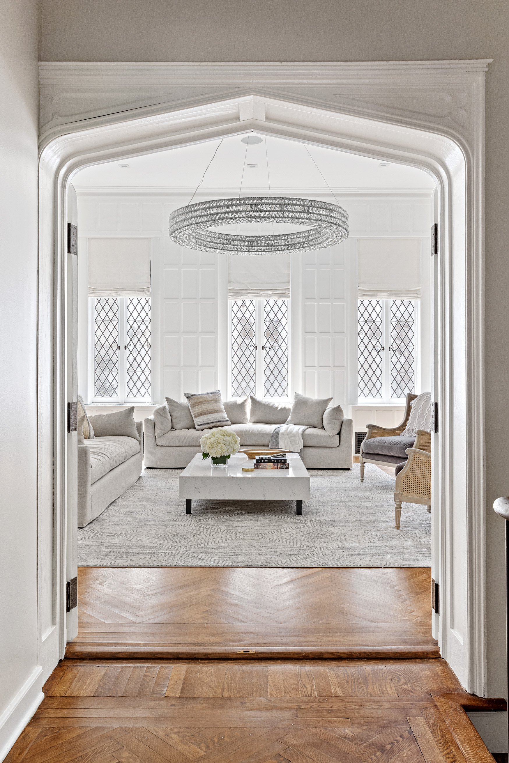 25 East 94th Street Manhattan, NY 10128 - Photo 7 of 33 a living room with furniture and a large window