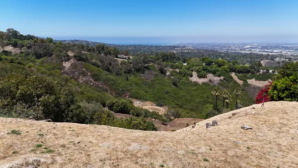 a view of a backyard of a house
