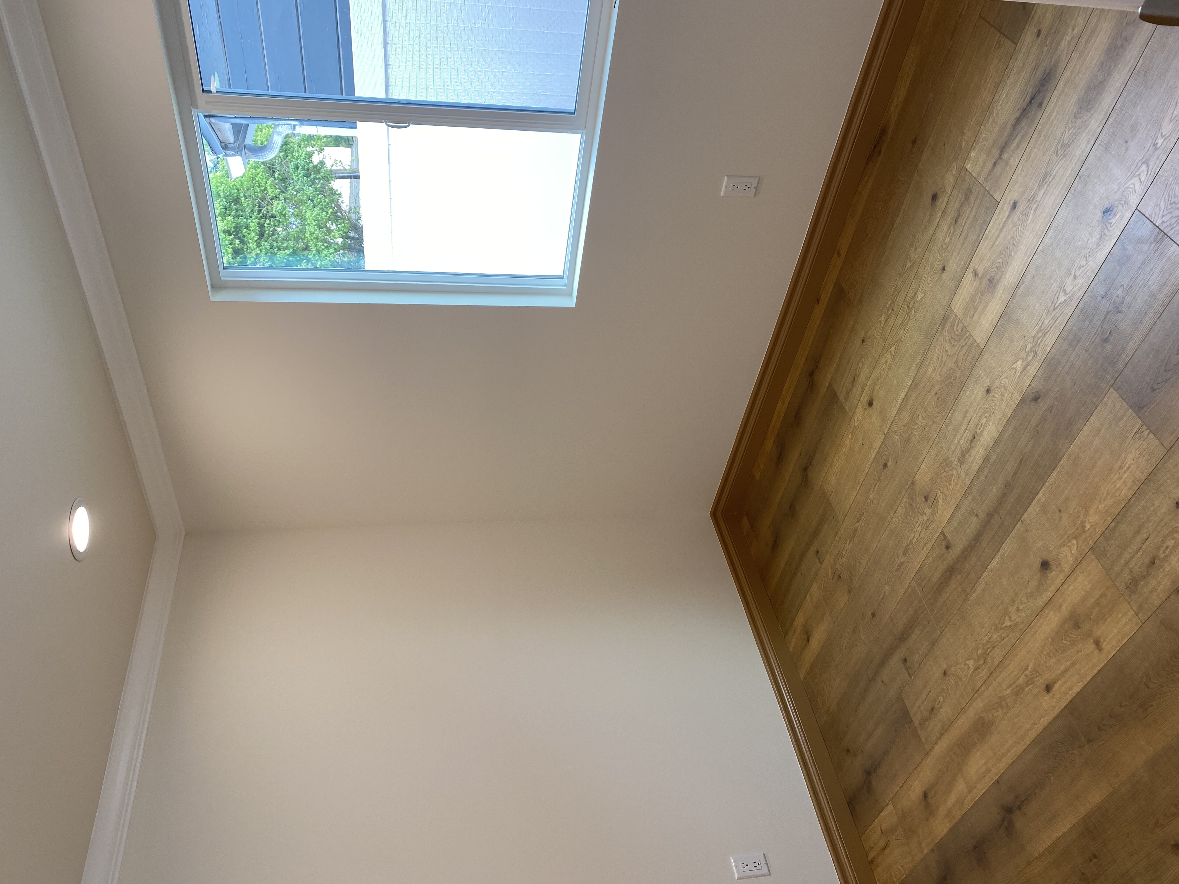 5151 Nagle Avenue, Unit GUEST Sherman Oaks, CA 91423 - Photo 6 of 11 a view of empty room with wooden floor and fan