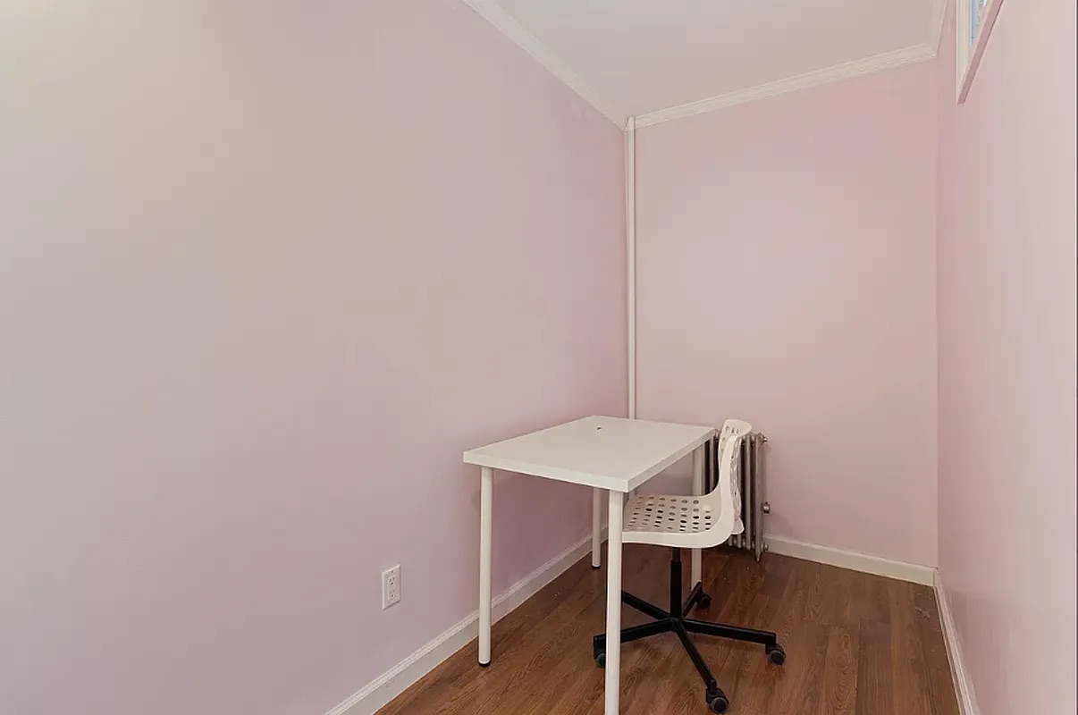 5-39 47th Road, Unit 2R Queens, NY 11101 - Photo 6 of 7 a view of a workspace with furniture