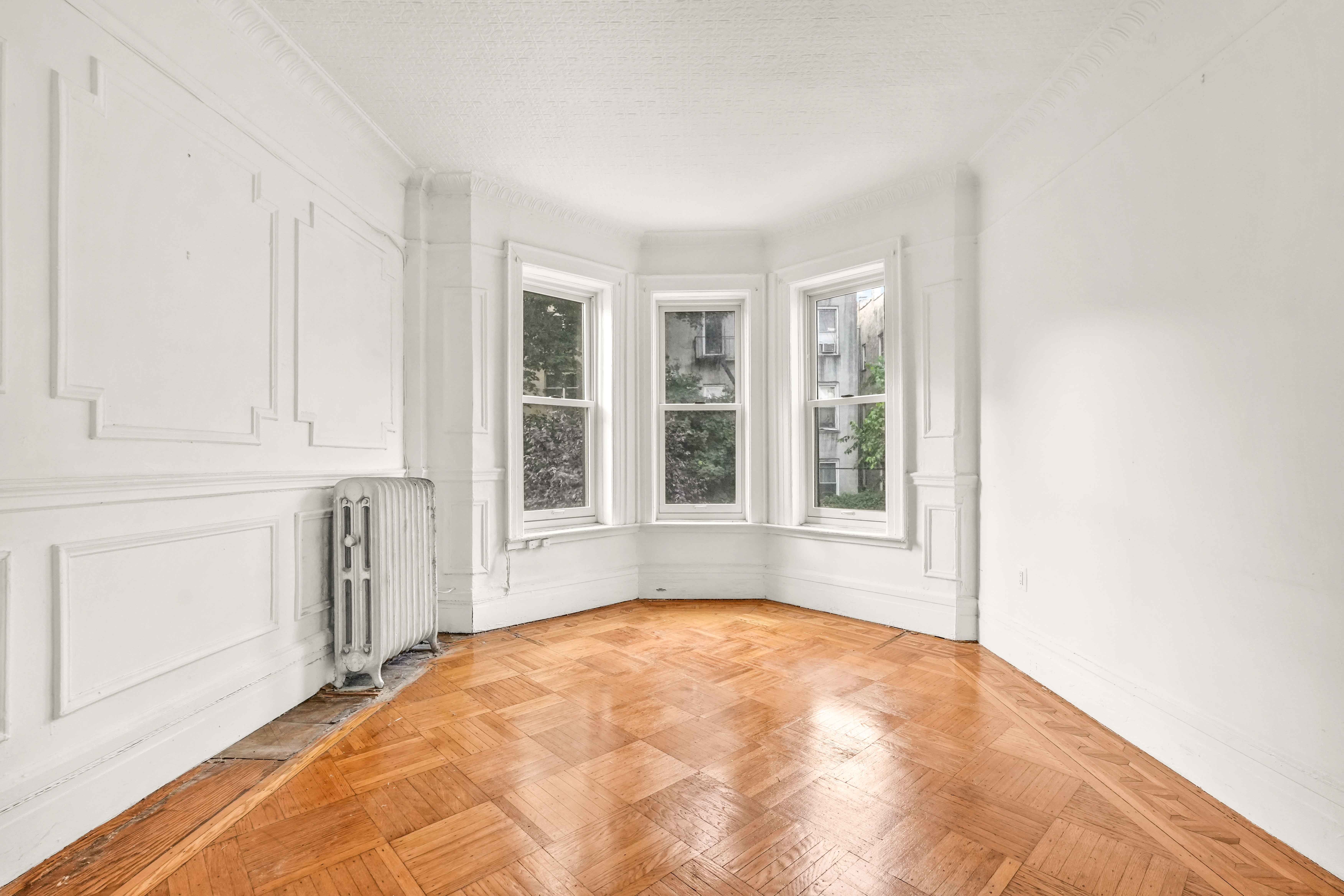 278 Lefferts Avenue Brooklyn, NY 11225 - Photo 12 of 56 a view of an empty room with a window