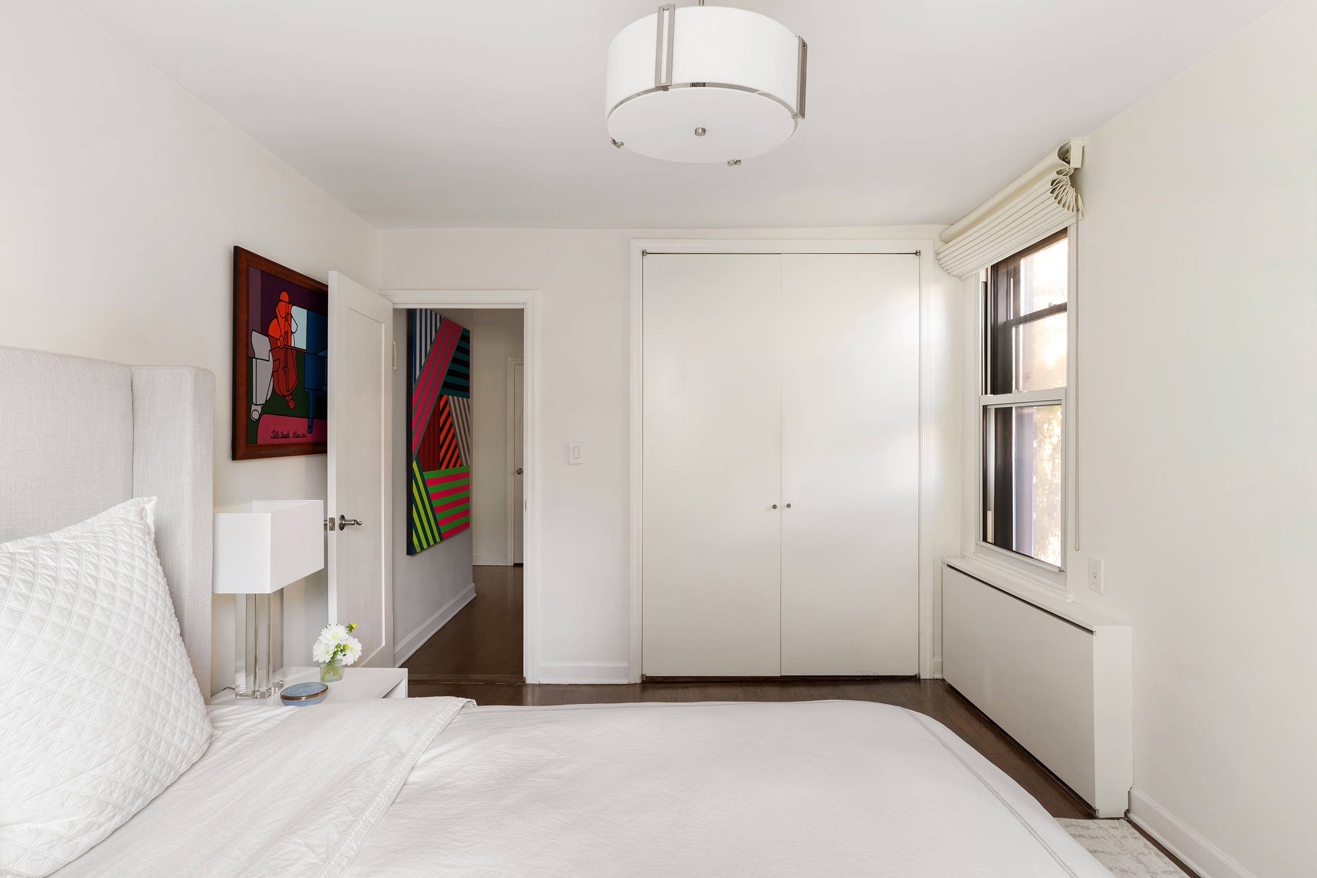 81 Bedford Street, Unit 4B Manhattan, NY 10014 - Photo 7 of 15 a view of a livingroom with an empty space and a window