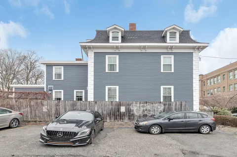 a car parked in front of a building