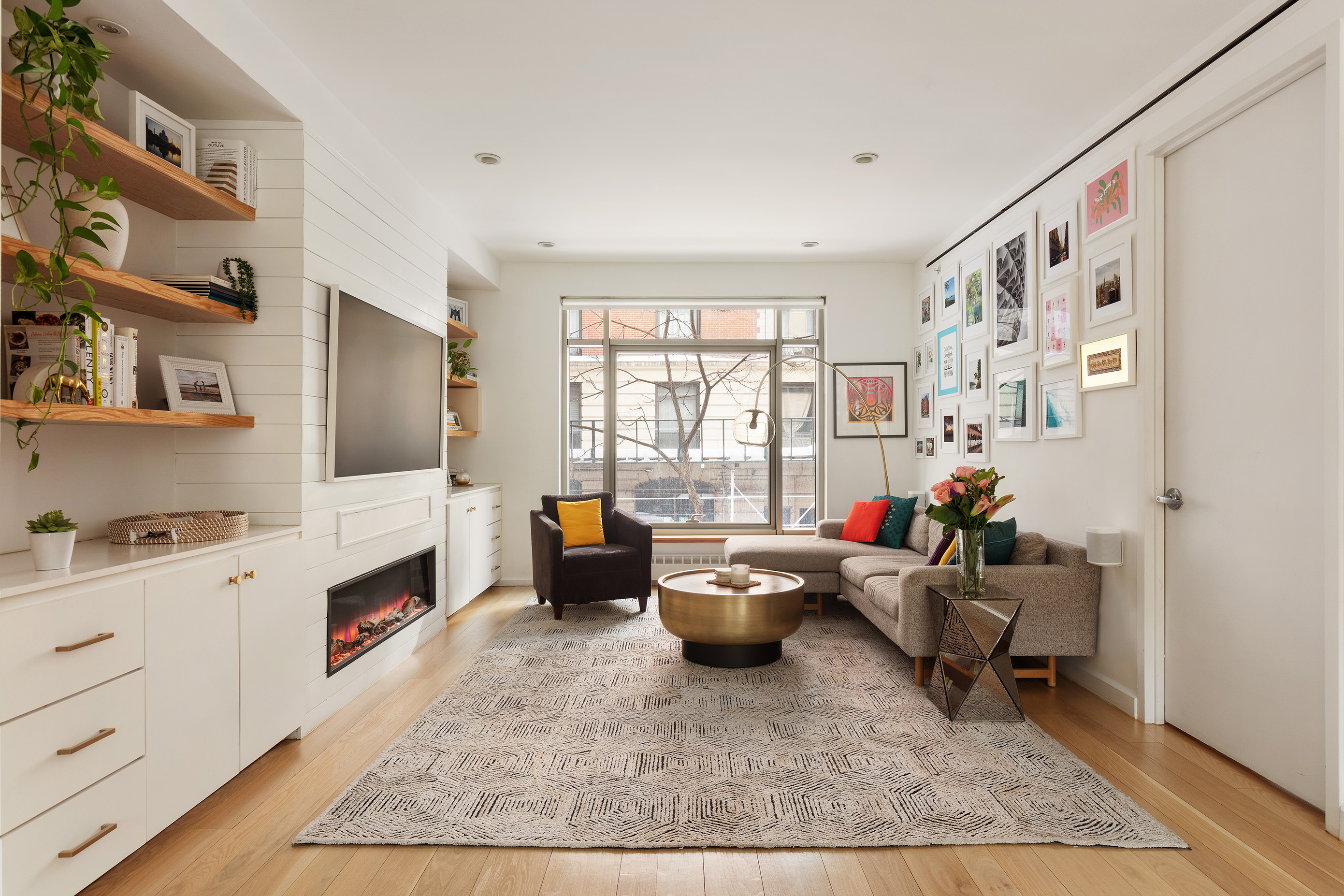 132 East 30th Street, Unit 2 Manhattan, NY 10016 - Photo 1 of 14 a living room with furniture and wooden floor