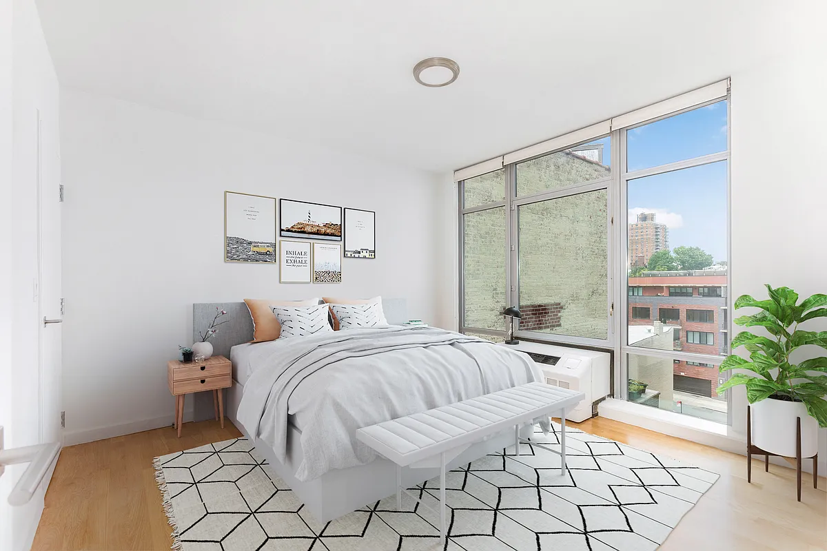 267 6th Street, Unit 3B Brooklyn, NY 11215 - Photo 3 of 15 a bedroom with a bed and a large window