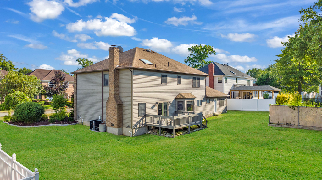 35 Poe Street Staten Island, NY 10307 - Photo 33 of 36 a front view of house with yard and green space