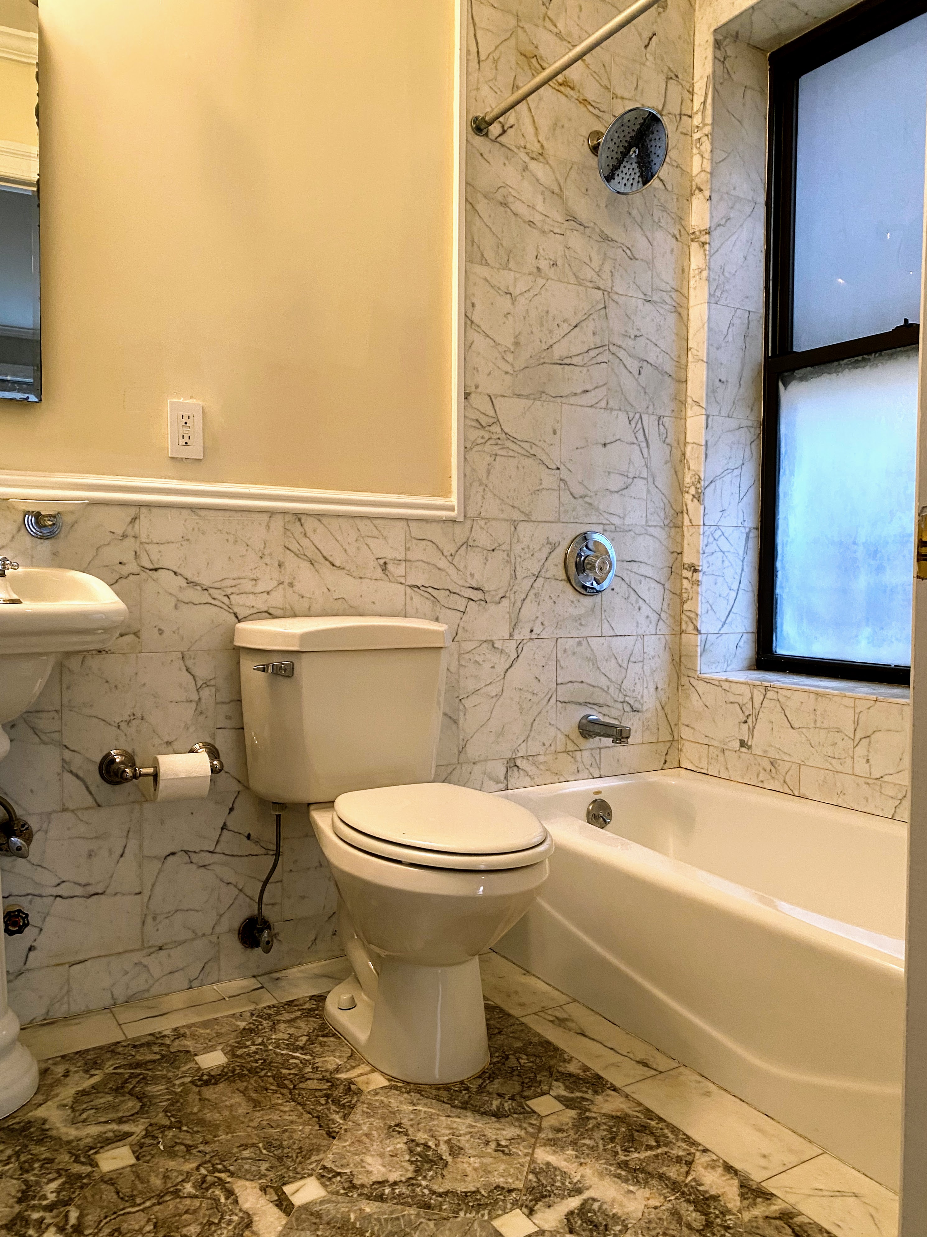 1240 Park Avenue, Unit 3B Manhattan, NY 10128 - Photo 5 of 12 a bathroom with a toilet and a shower