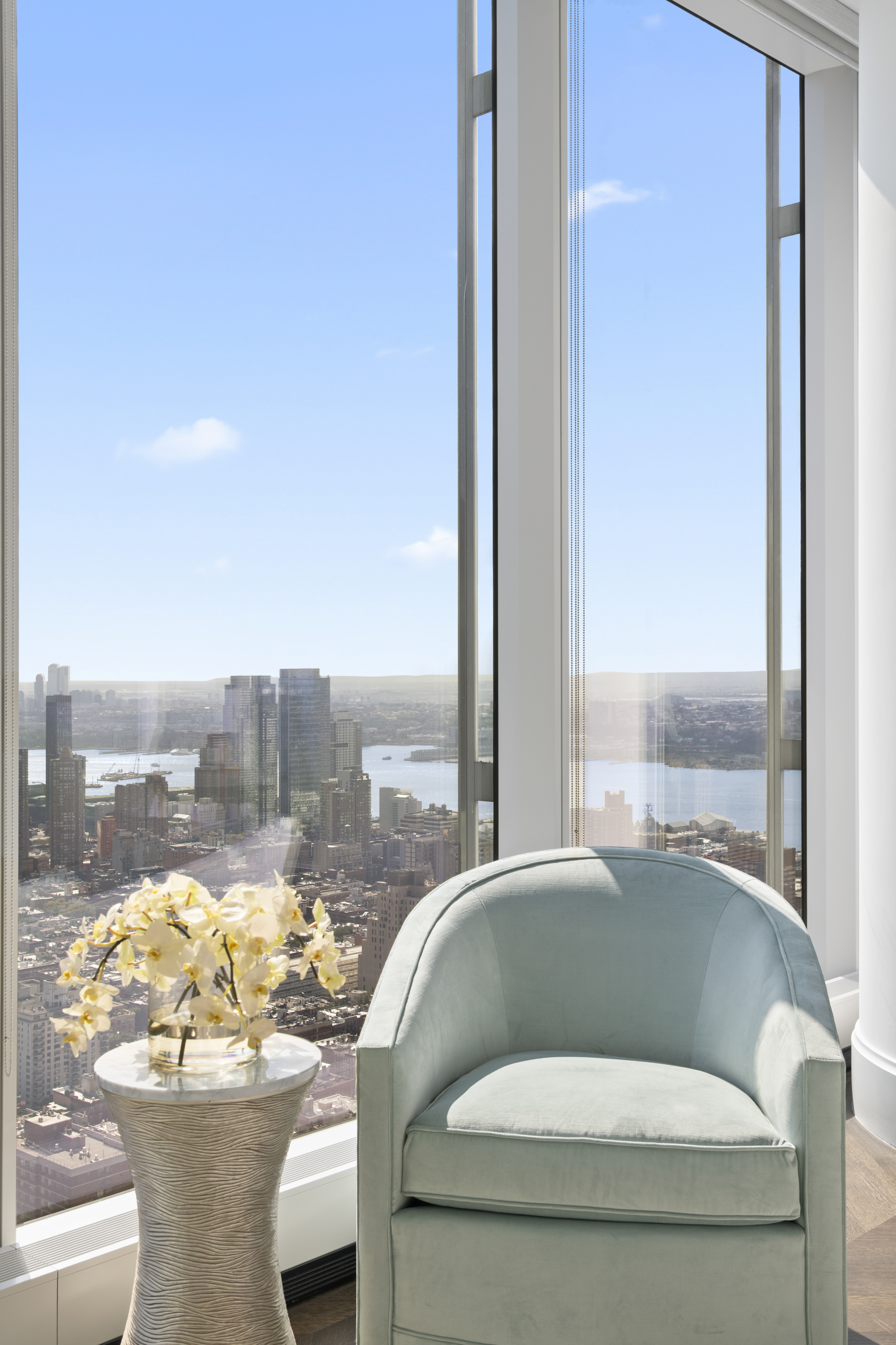 217 West 57th Street, Unit 58W Manhattan, NY 10019 - Photo 12 of 30 a living room with furniture