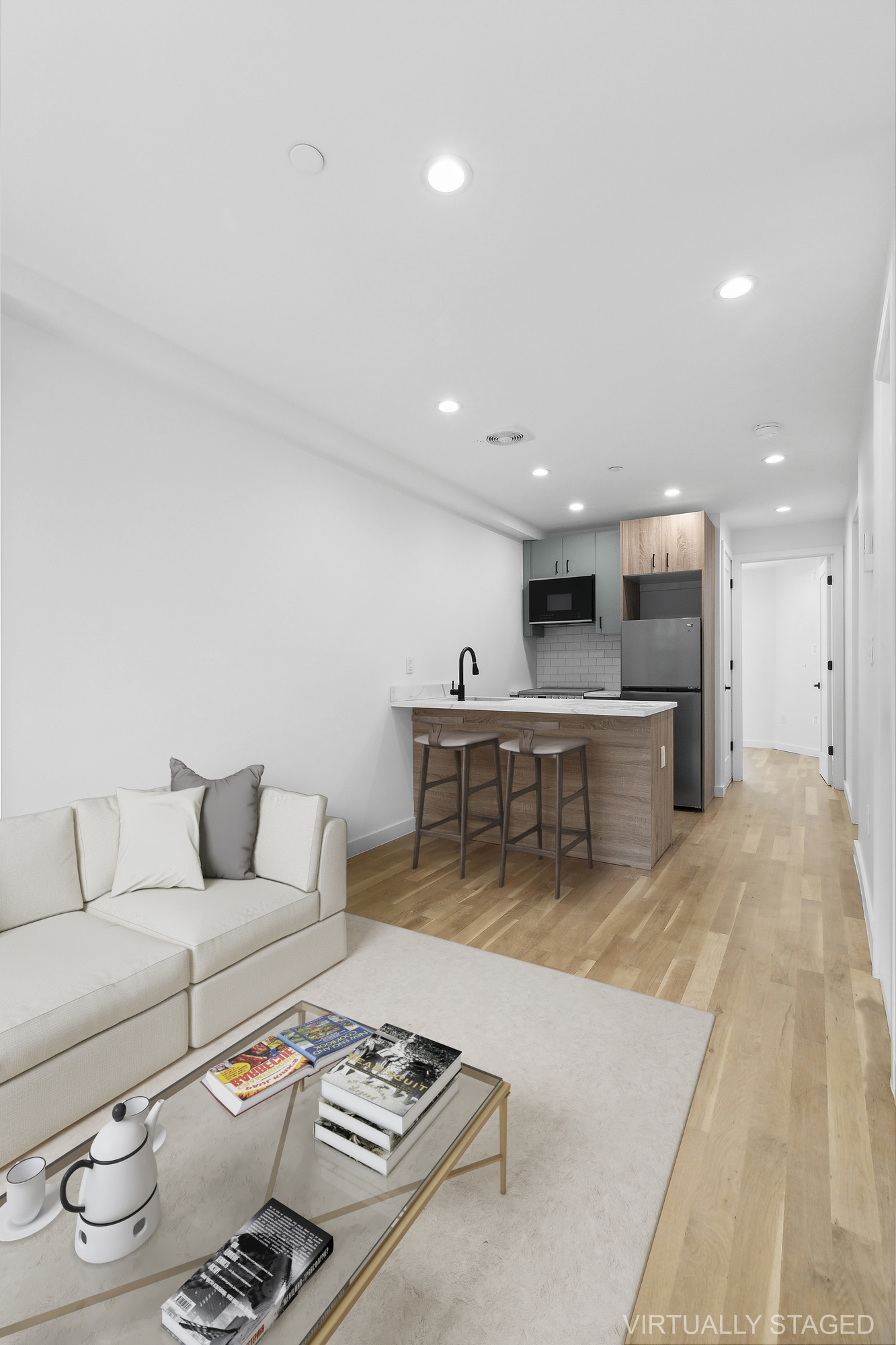 116 Madison Street Brooklyn, NY 11216 - Photo 13 of 20 a living room with furniture and a table