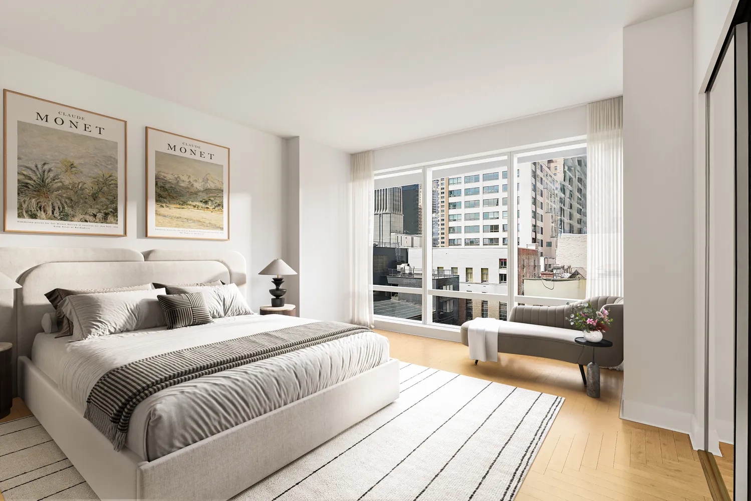 a spacious bedroom with a large bed and a couch