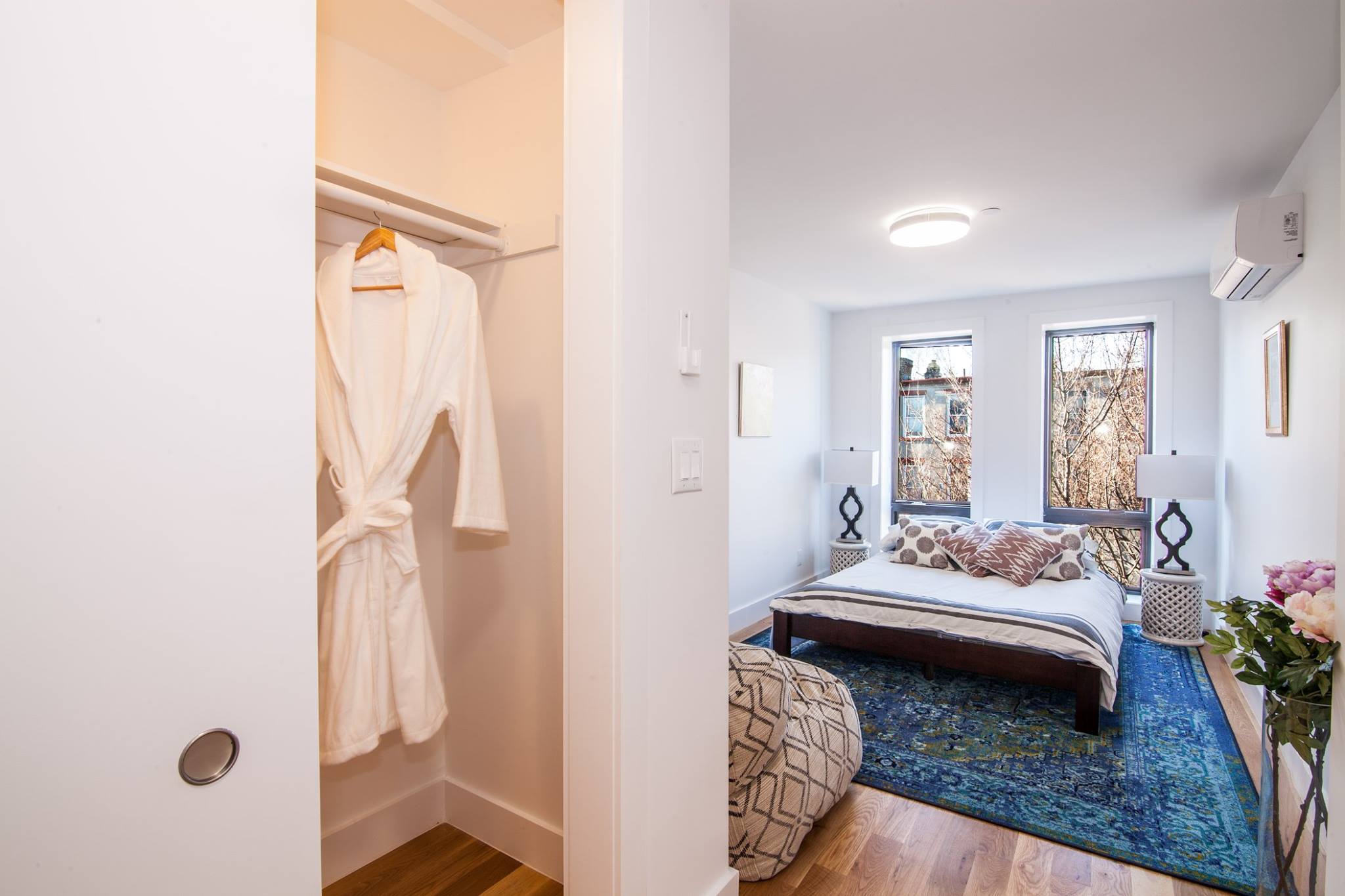 385 Jefferson Avenue, Unit C Brooklyn, NY 11221 - Photo 10 of 21 a bedroom with a bed and a couch