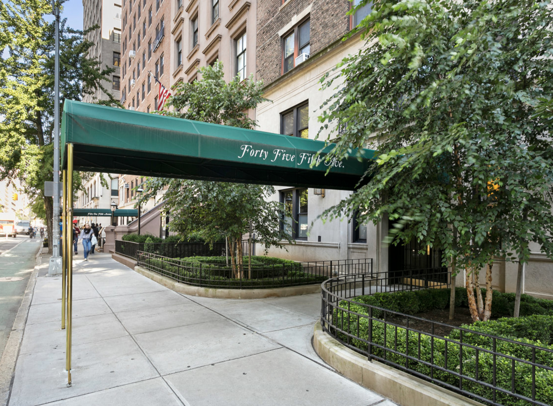 45 5th Avenue, Unit 9D Manhattan, NY 10003 - Photo 6 of 7 a view of a entrance gate of the house and trees